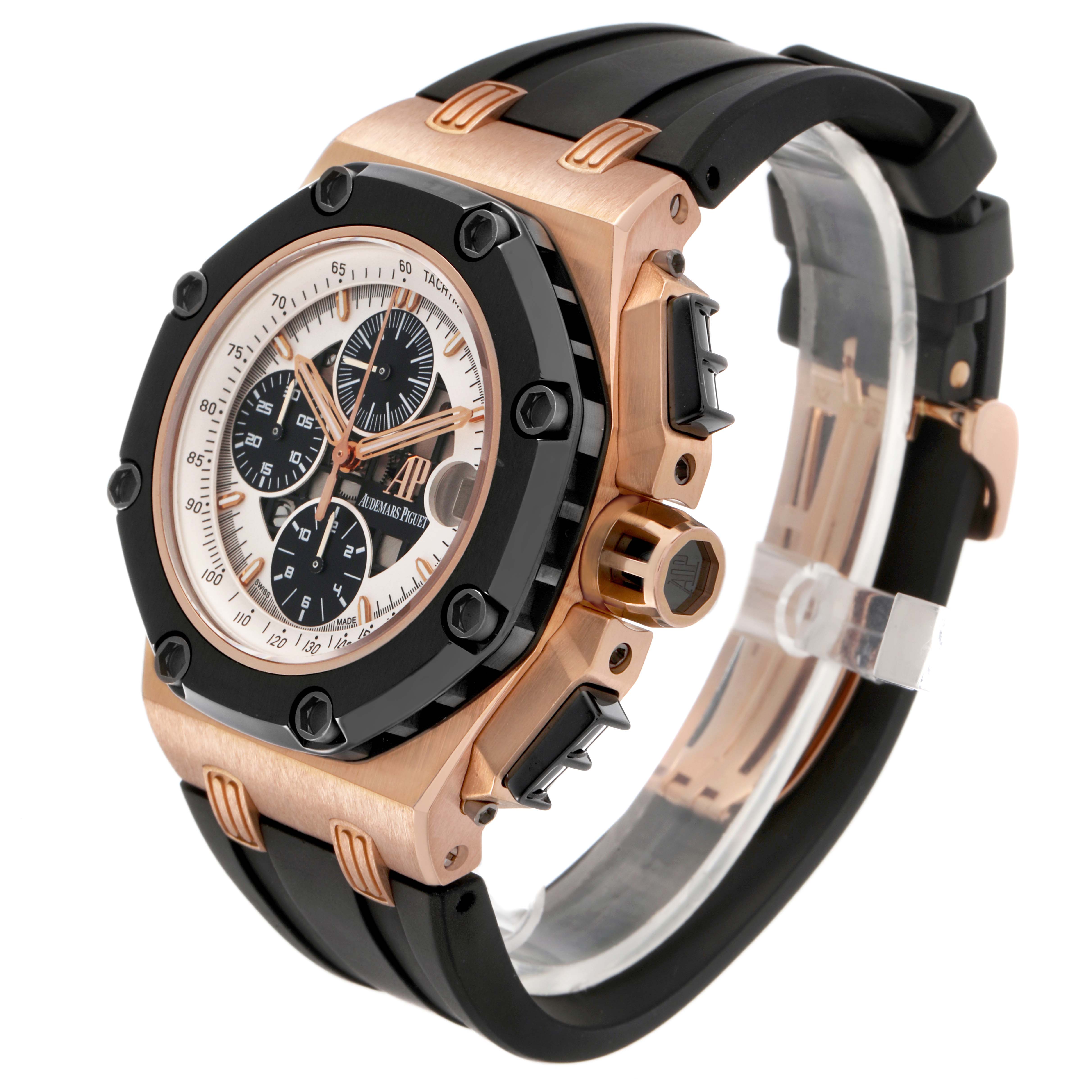The Audemars Piguet Royal Oak Offshore 26078RO.00.D002CR.01 Men's Rose Gold White Dial is shown at an angled side view highlighting the bezel, chronograph dials, and strap.