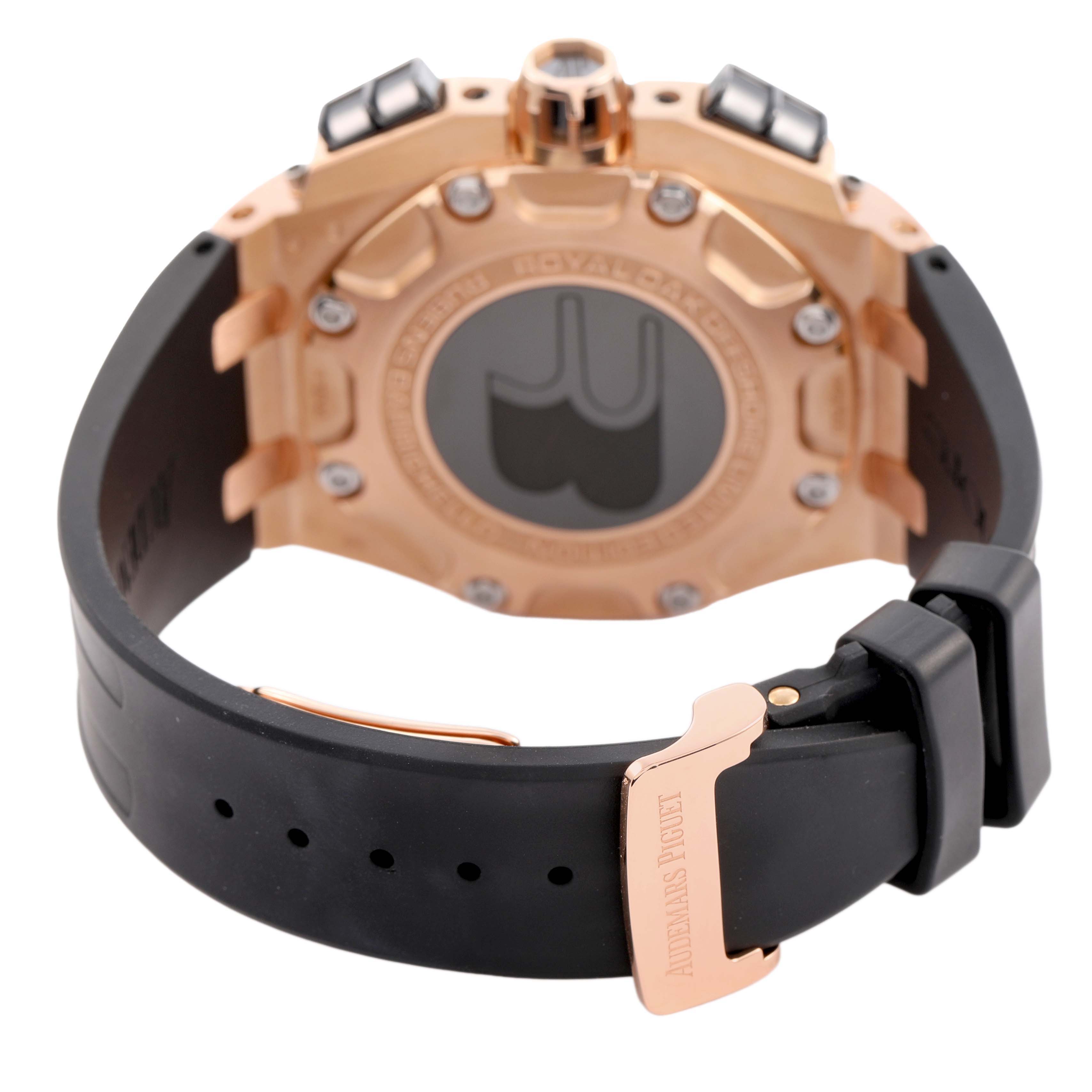 The image shows the back of the Audemars Piguet Royal Oak Offshore 26078RO.00.D002CR.01 Men's Rose Gold White Dial with its strap and clasp visible.