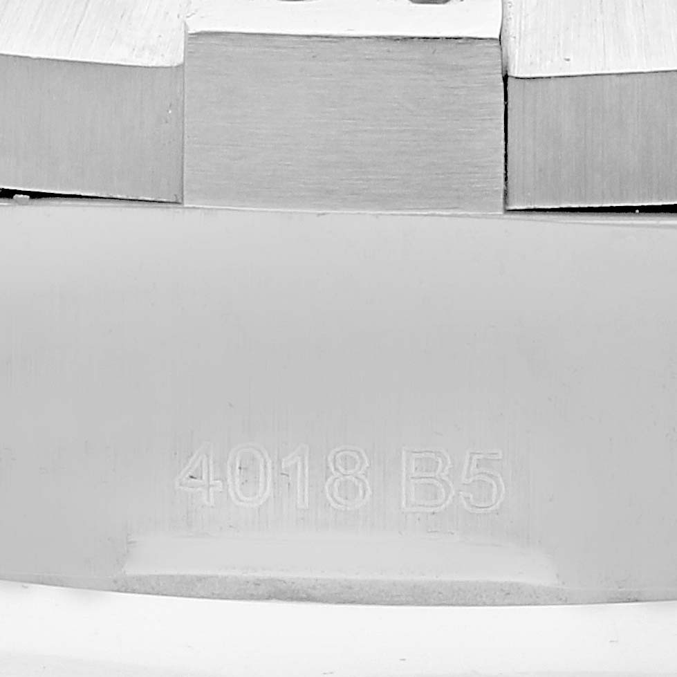 The image shows a close-up of the caseback edge with engraved numbers of a Breitling Colt A17388 Men's Stainless Steel Black Dial A17388 Men's Stainless Steel Black Dial watch.