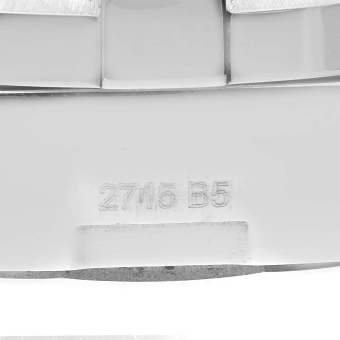 This image shows a close-up of the bracelet with the serial number for a Breitling Colt A13388 Men's Stainless Steel Black Dial A13388 Men's Stainless Steel Black Dial model watch.