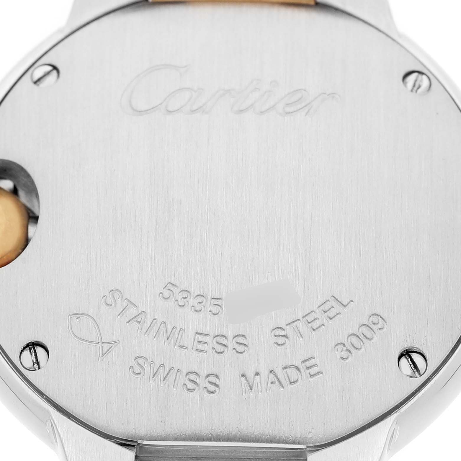 The image shows the back of a Ballon Bleu watch by Cartier, detailing engravings and screws.