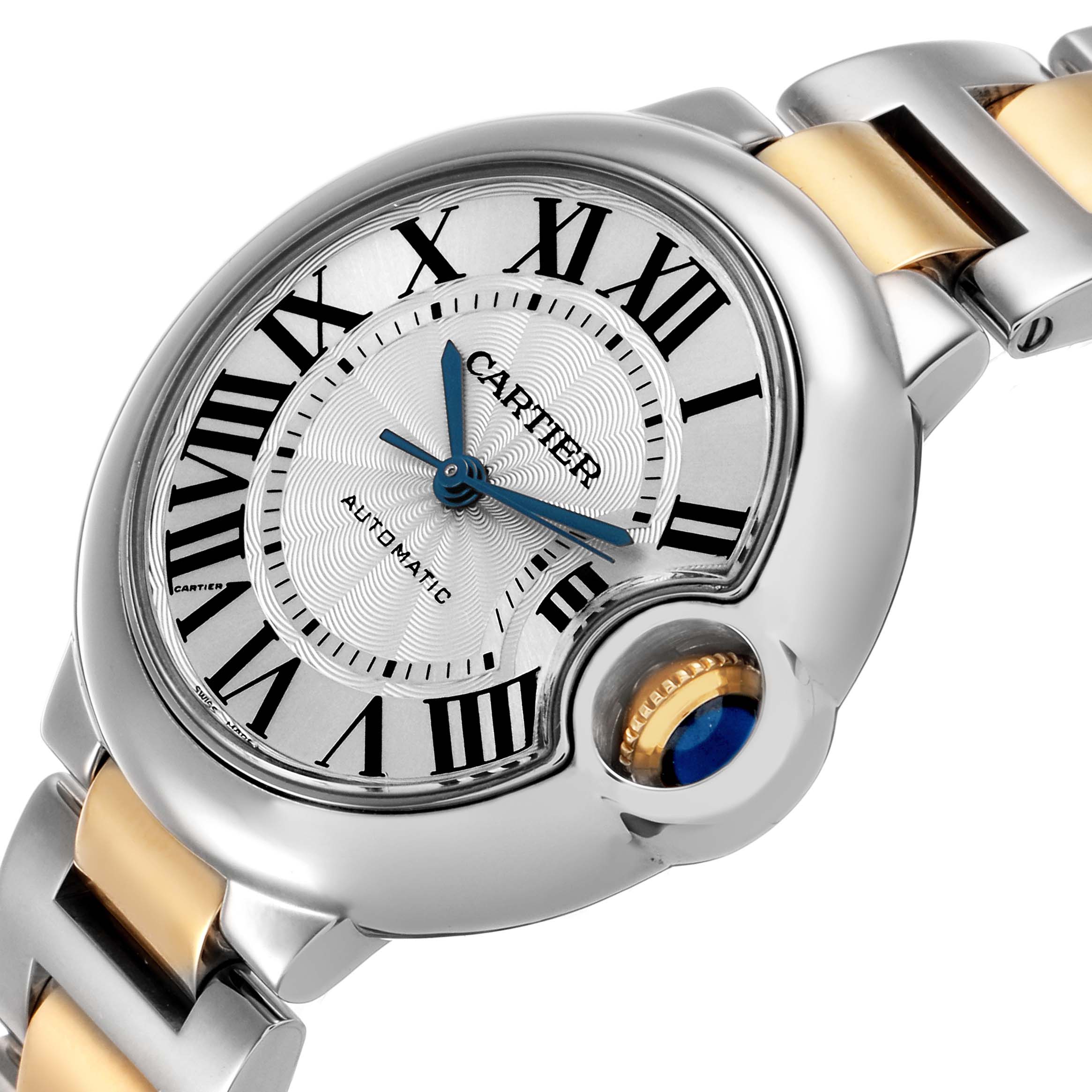The Cartier Ballon Bleu W2BB0002 Women's Steel and Gold (two tone) Silver Dial watch is shown at an angled view highlighting the dial, Roman numerals, and crown with its distinctive blue gem.
