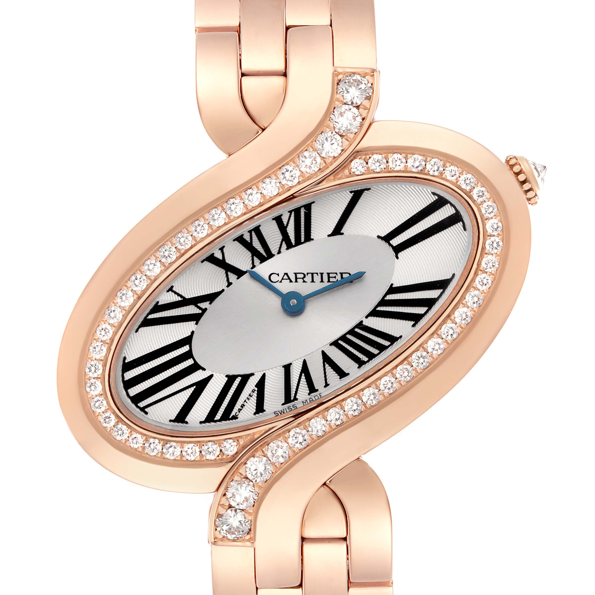 The Cartier Delices WG800006 Women
s Rose Gold Silver Dial WG800006 Women
s Rose Gold Silver Dial watch is shown from a front angle, highlighting the oval face, diamond bezel, and partial bracelet.