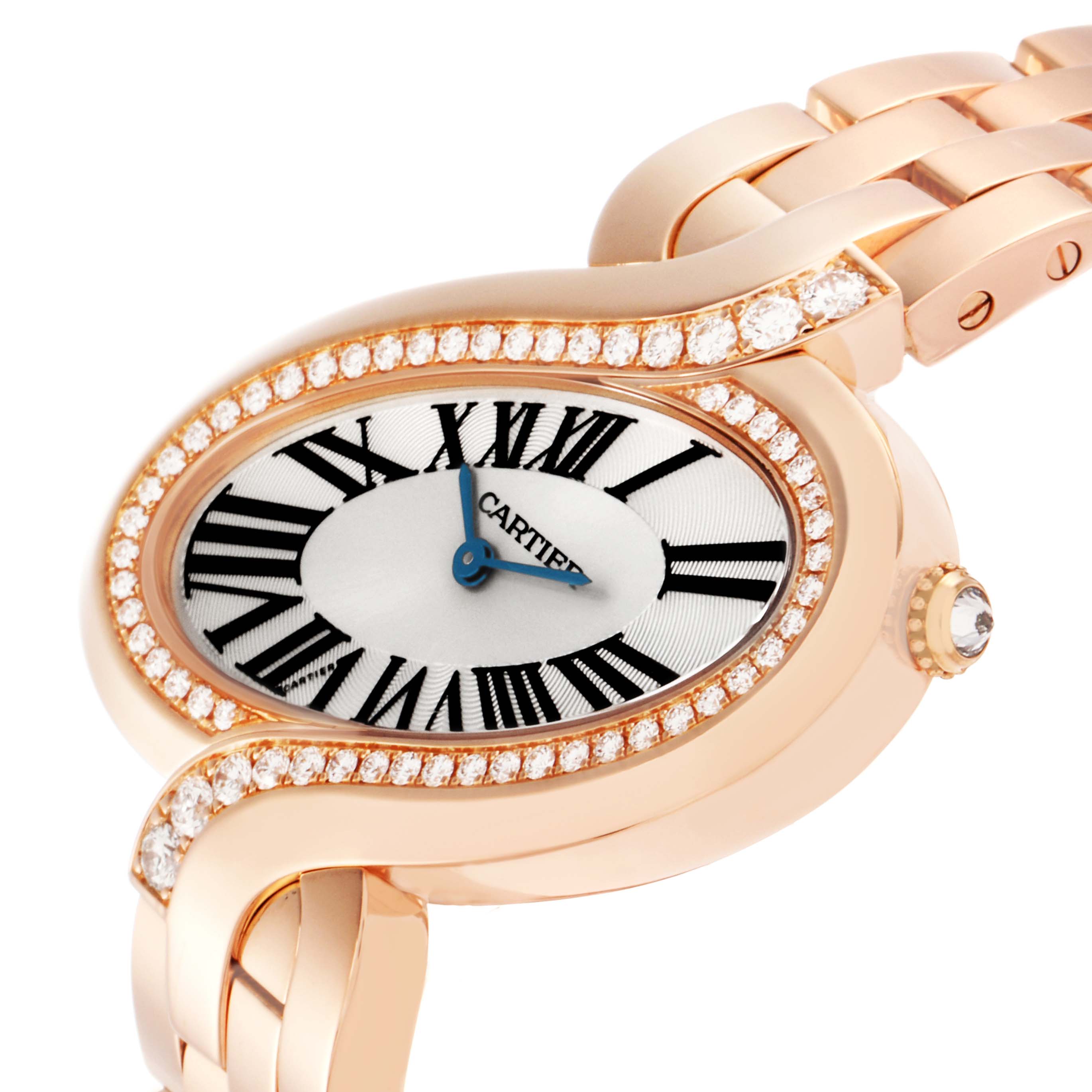 The Cartier Delices WG800006 Women
s Rose Gold Silver Dial WG800006 Women
s Rose Gold Silver Dial watch is shown from a top-side angle, highlighting the oval face, Roman numerals, diamond bezel, and bracelet.