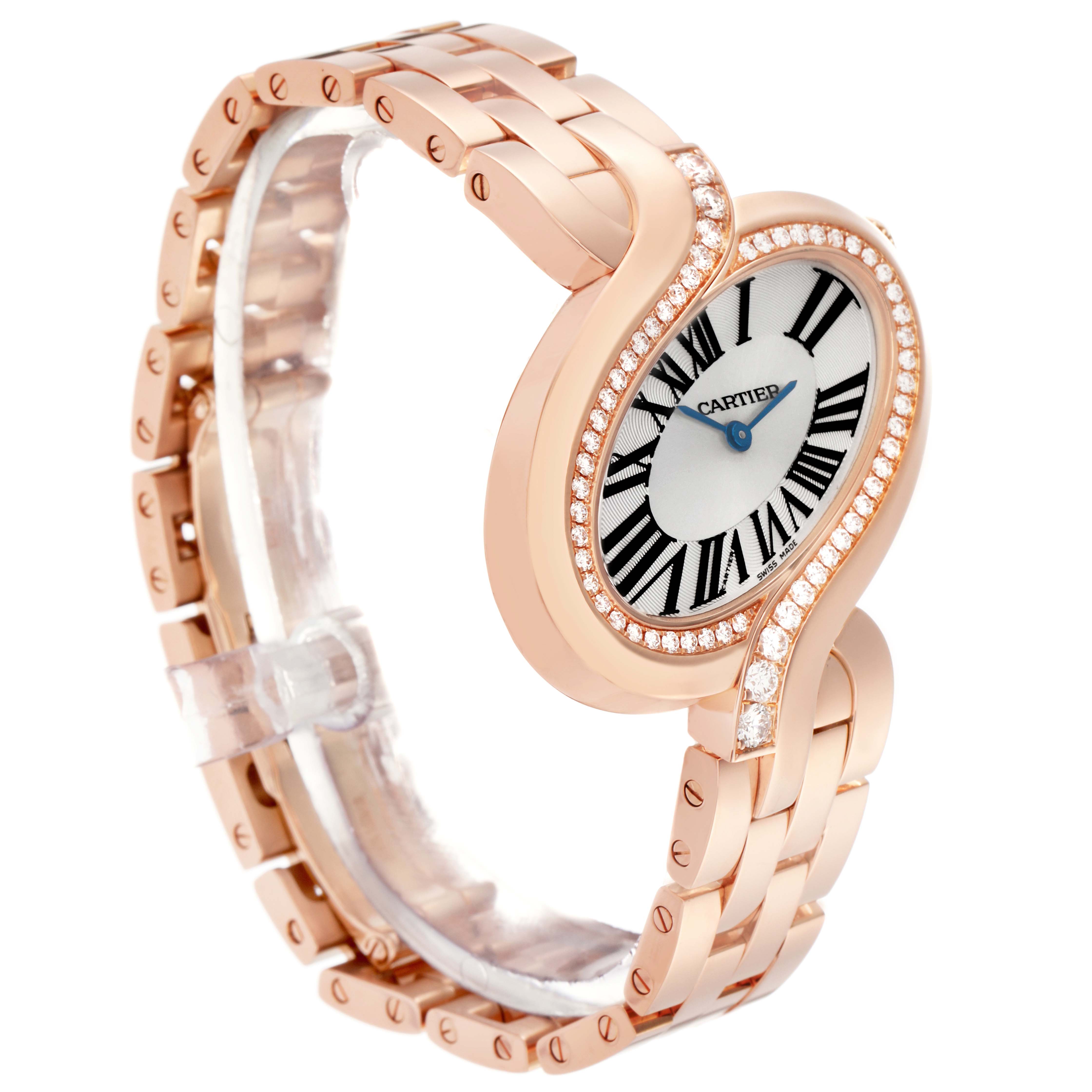 The Cartier Delices WG800006 Women
s Rose Gold Silver Dial WG800006 Women
s Rose Gold Silver Dial watch is shown at a three-quarter angle, highlighting the elliptical face, diamond-set bezel, and rose gold bracelet.