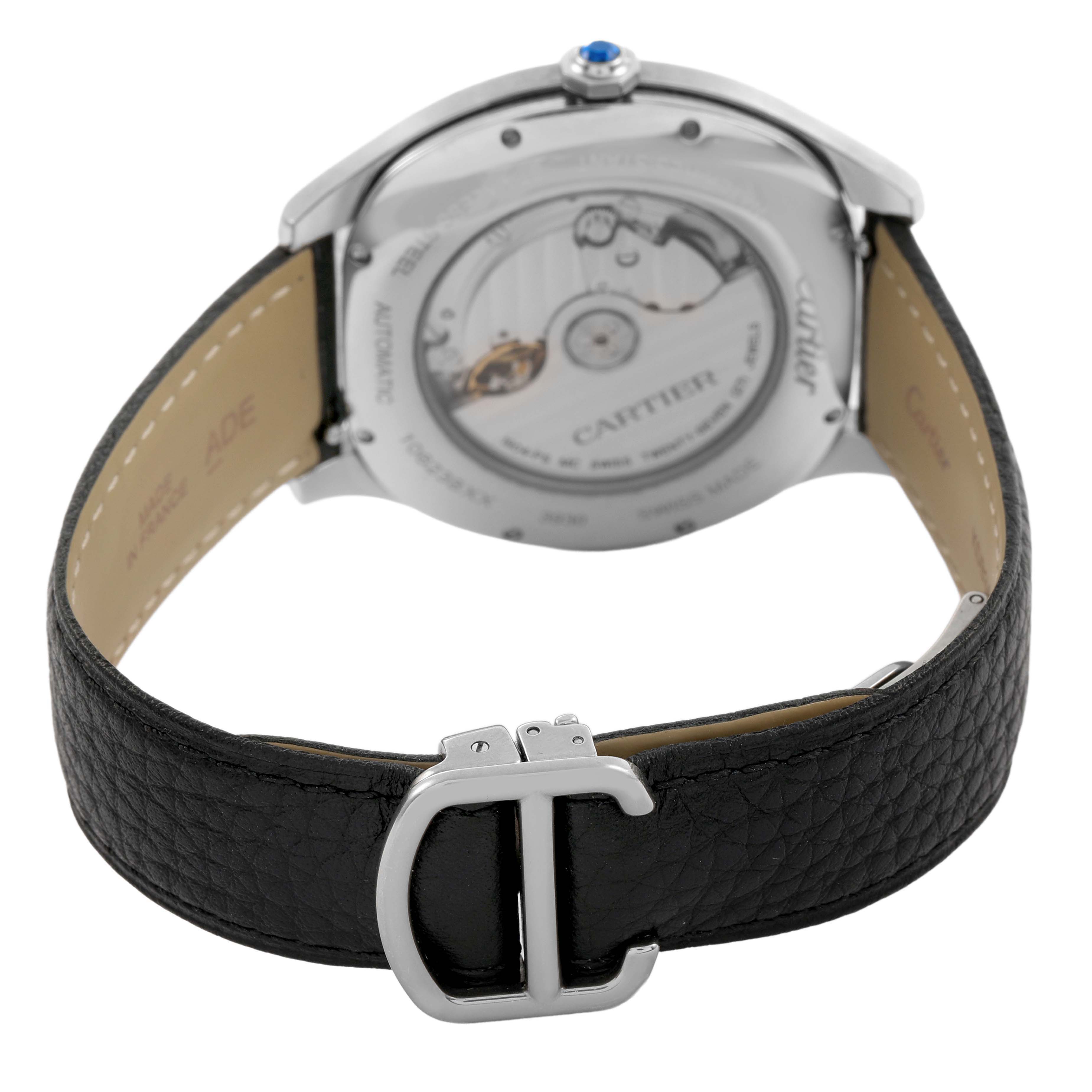 The Drive de Cartier watch is shown from the back, displaying the movement and strap with a view of the buckle.