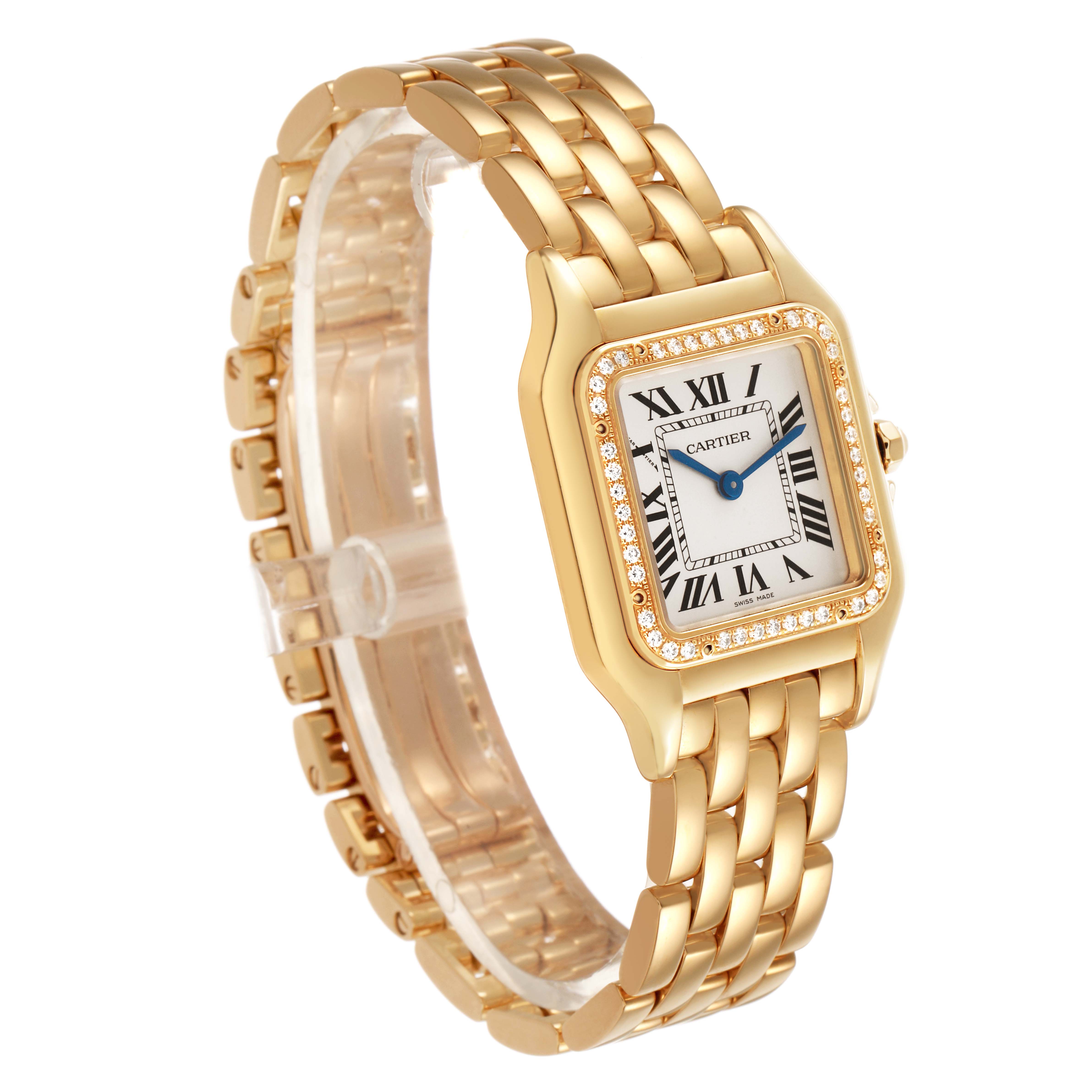 The Cartier Panthère watch is shown at an angle highlighting its gold bracelet, diamond-set bezel, and Roman numeral dial.