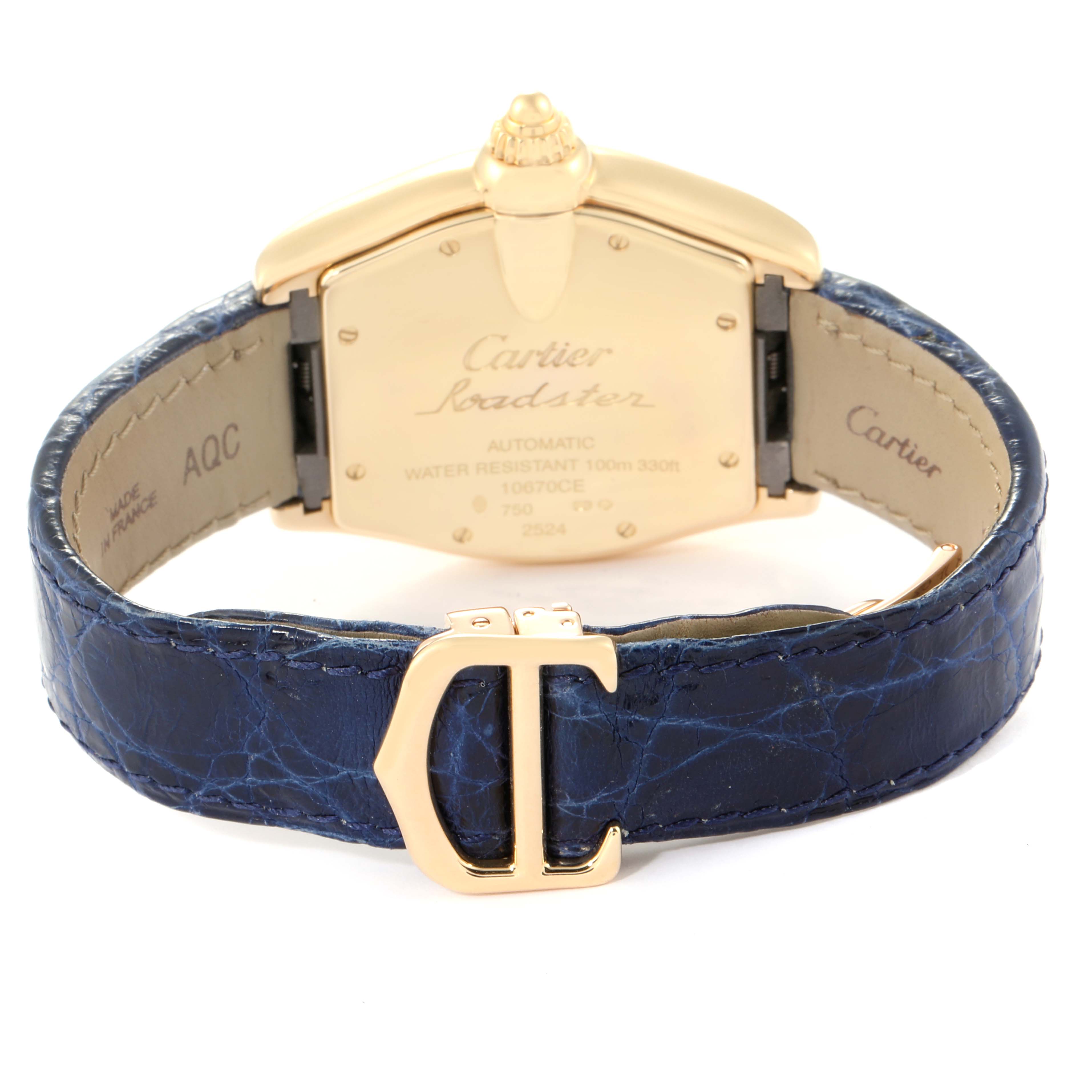 The image shows the back and clasp of the Cartier Roadster W62005V2 Men's Yellow Gold Silver Dial W62005V2 Men's Yellow Gold Silver Dial watch, highlighting its gold case and blue leather strap.