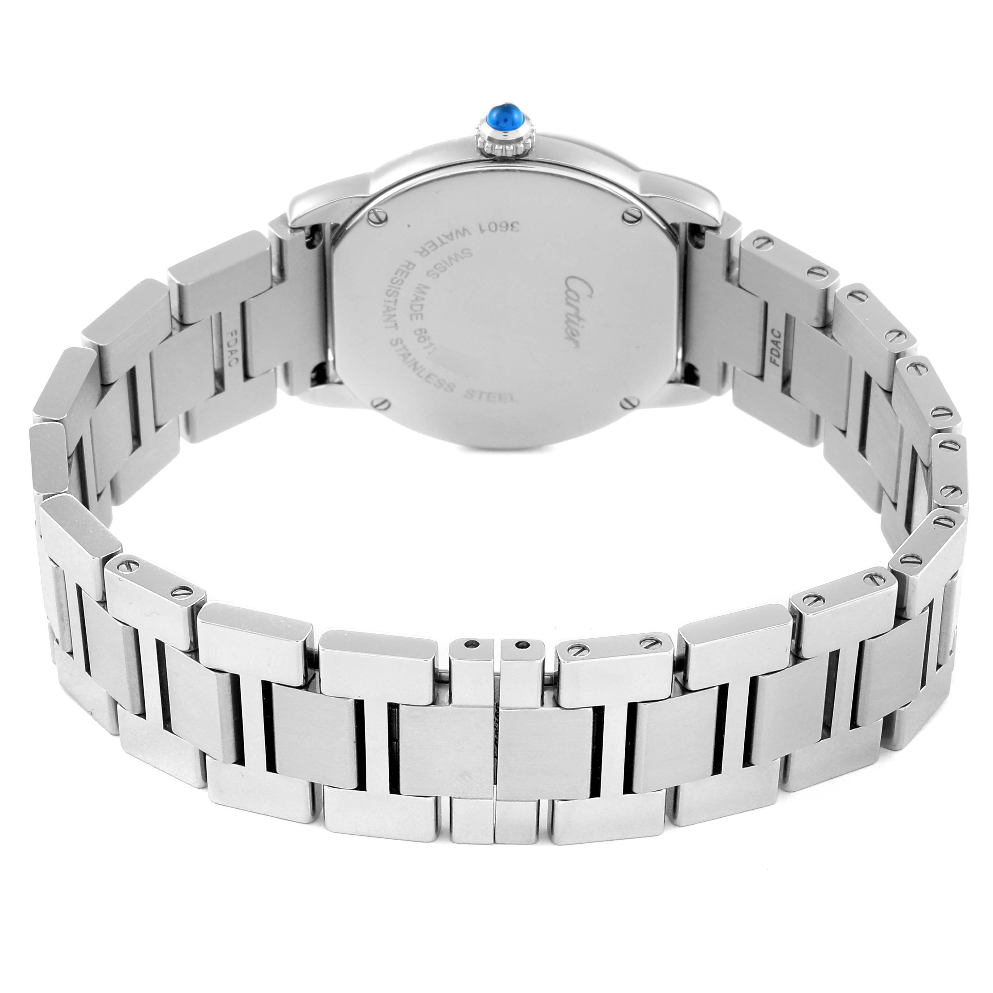 The Ronde model by Cartier is shown from the back, highlighting its stainless steel case and bracelet with a visible blue crown.