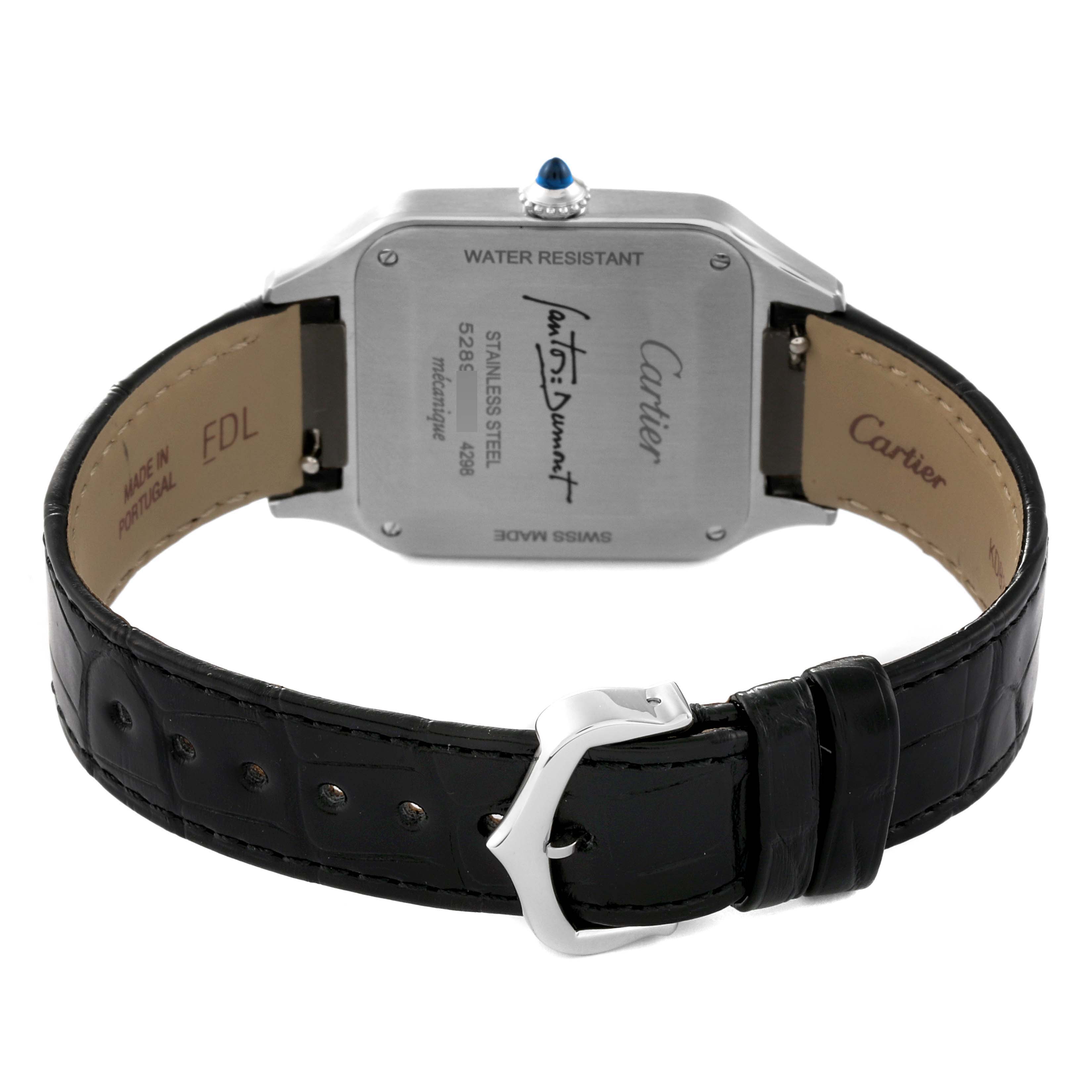 The image shows a rear view of a Santos Dumont model by Cartier, highlighting the back of the watch and the leather strap.
