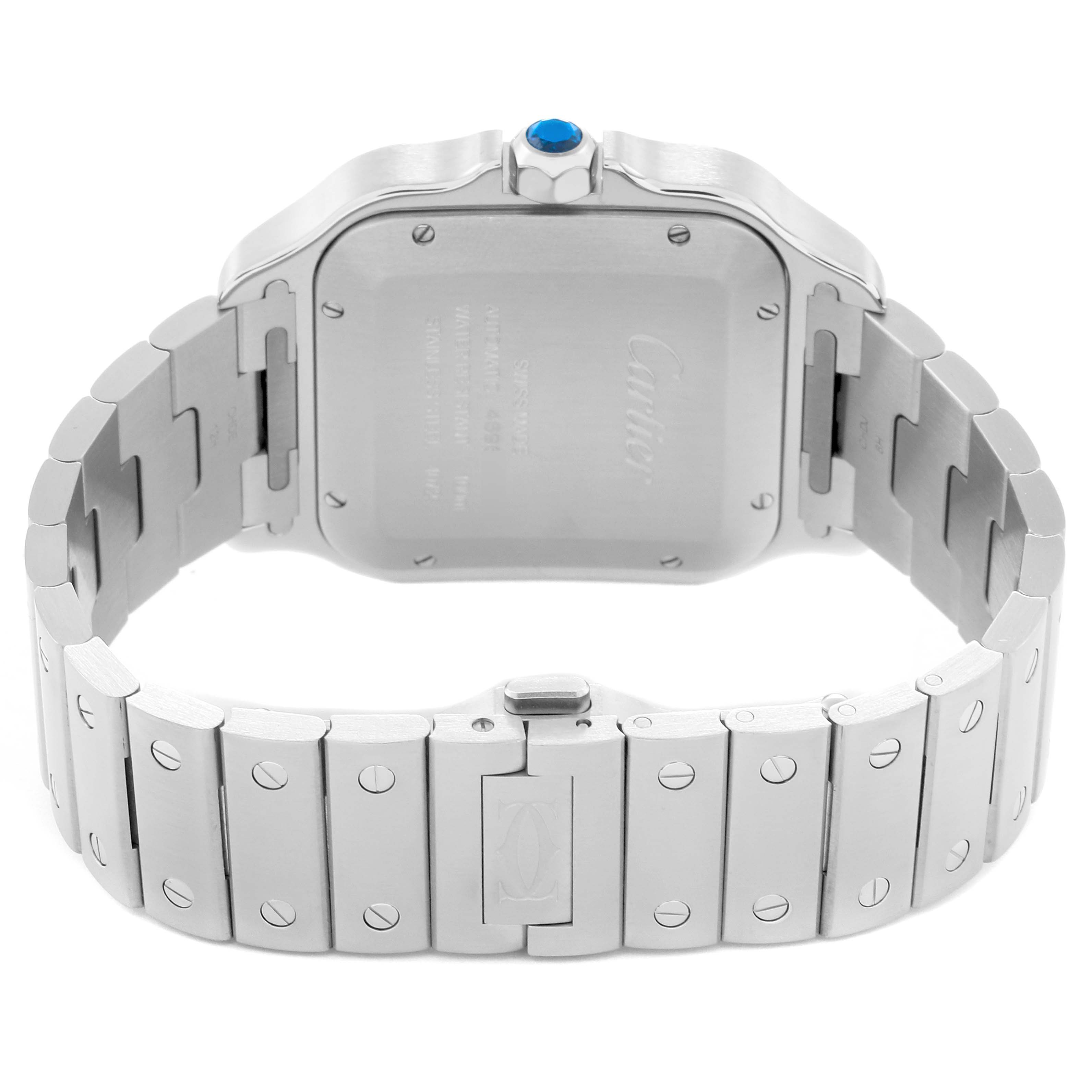 The image shows the back of a Cartier Santos WSSA0018 Men
s Stainless Steel Silver Dial WSSA0018 Men
s Stainless Steel Silver Dial watch, highlighting the case back, bracelet, and the blue cabochon on the crown.
