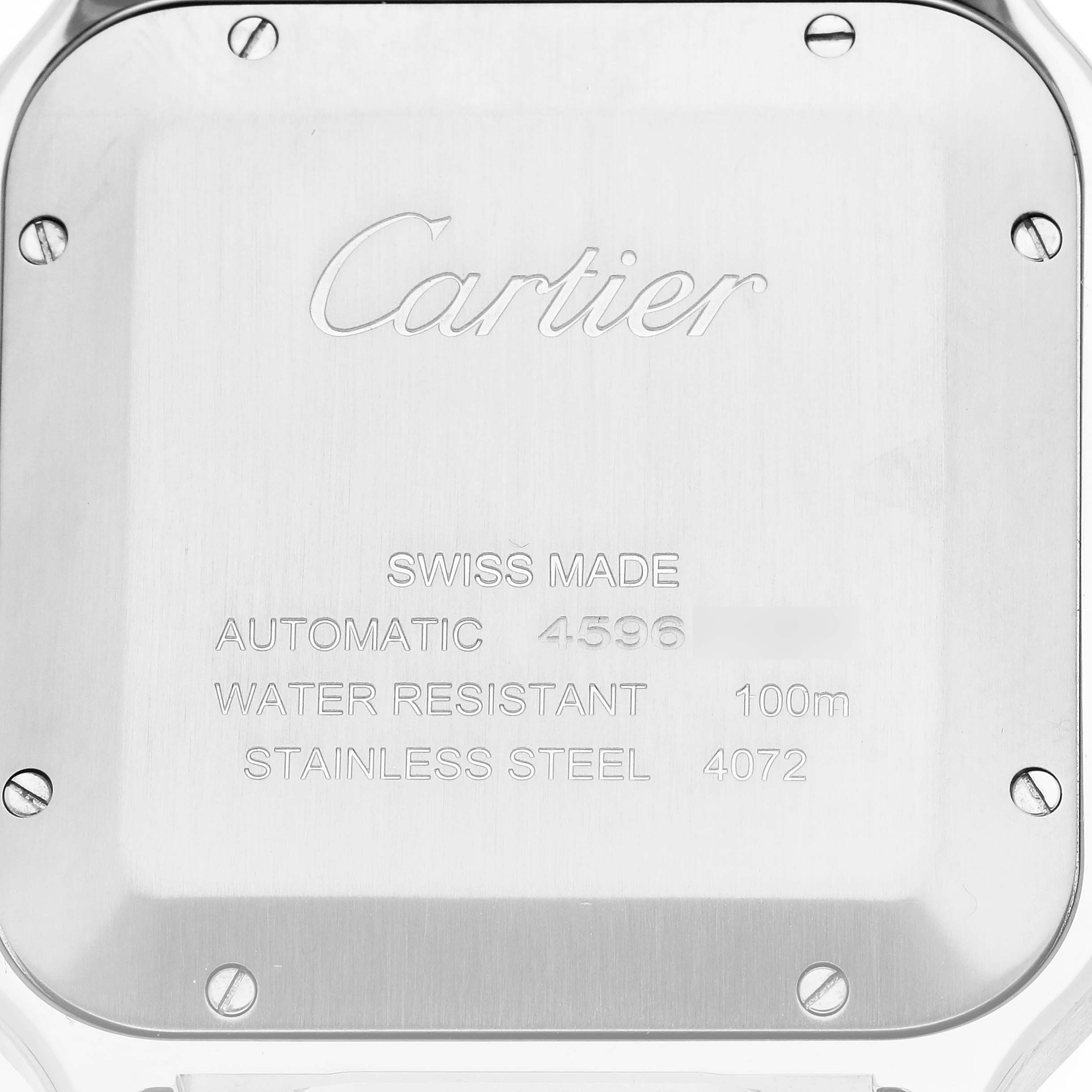 The image shows the back of a Santos model by Cartier, highlighting the engraved details and screws.