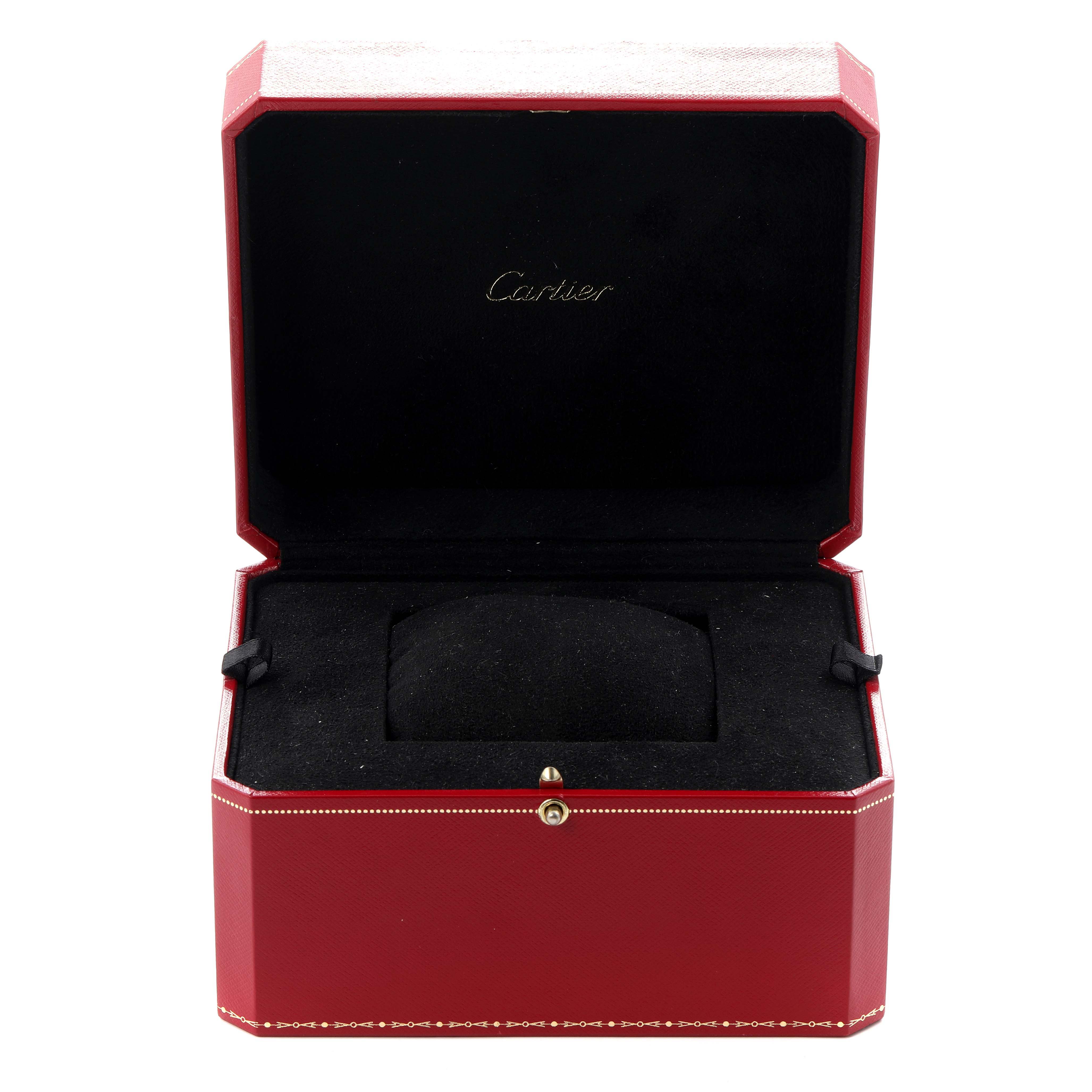 A Cartier Tank Américaine watch box is shown open, displaying its interior with the brand logo.