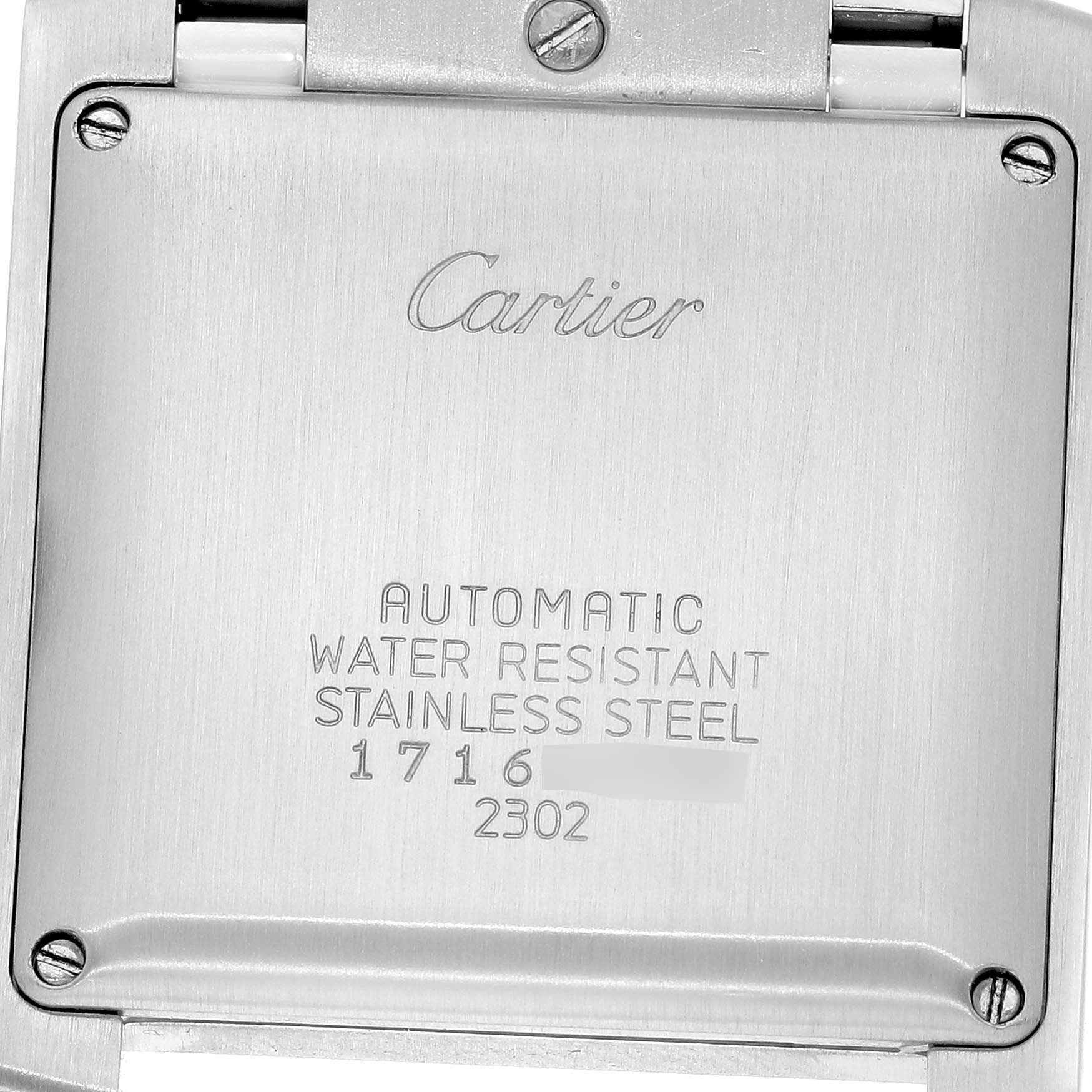 The image shows the back case of a Cartier Tank Française watch, highlighting the engravings and screws.