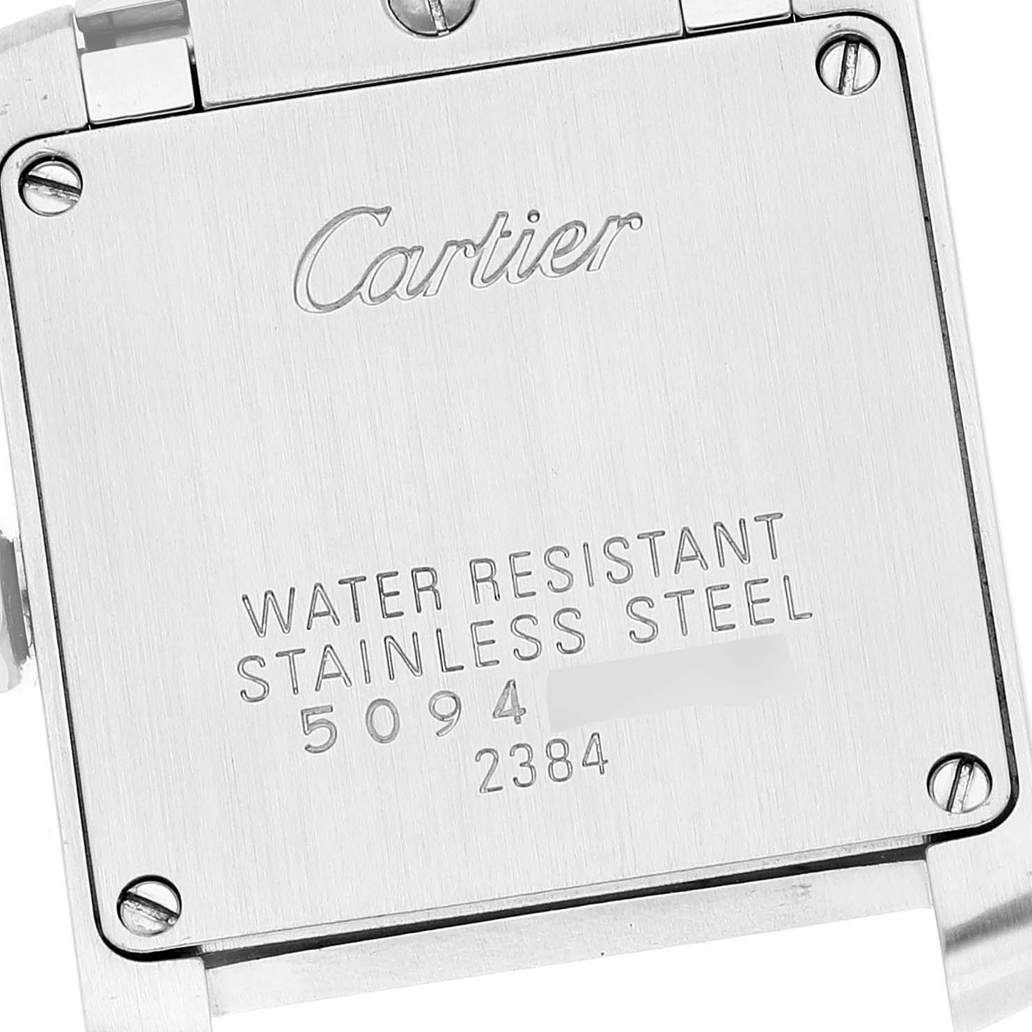 This image shows the case back of a Cartier Tank Française watch, highlighting the water resistance and material details.