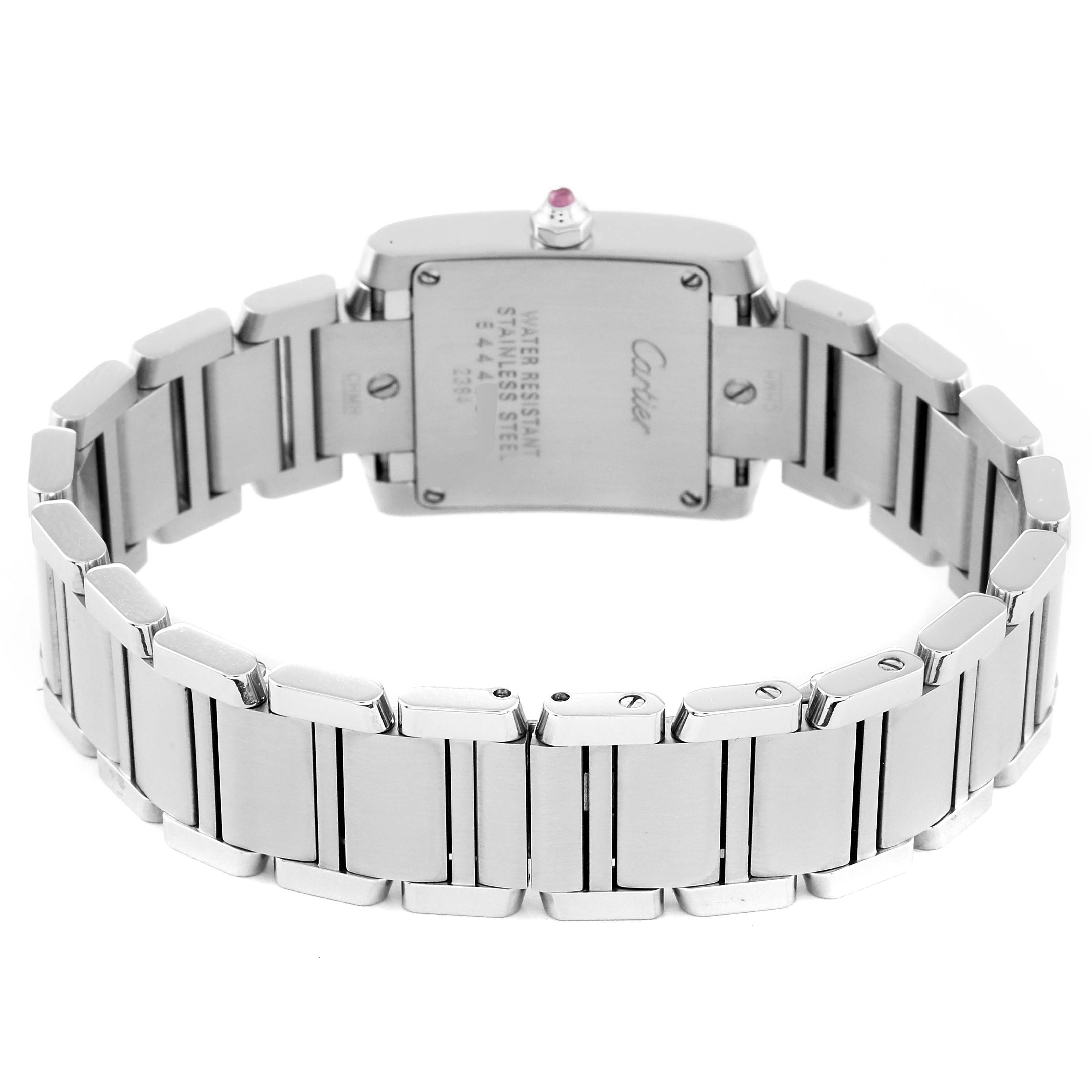 The image shows the back of the Cartier Tank Française watch, highlighting its stainless steel case and bracelet.