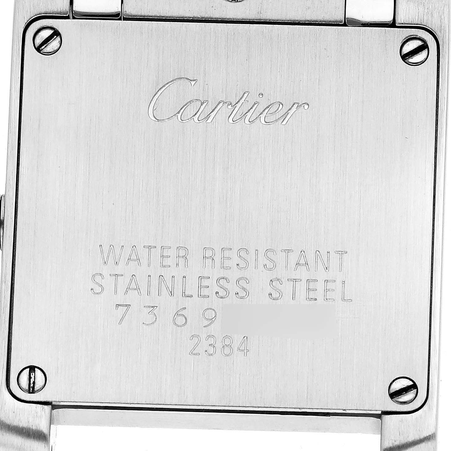 This image shows the case back of the Cartier Tank Francaise W51008Q3 Women's Stainless Steel Silver Dial W51008Q3 Women's Stainless Steel Silver Dial watch with engraved branding and details.
