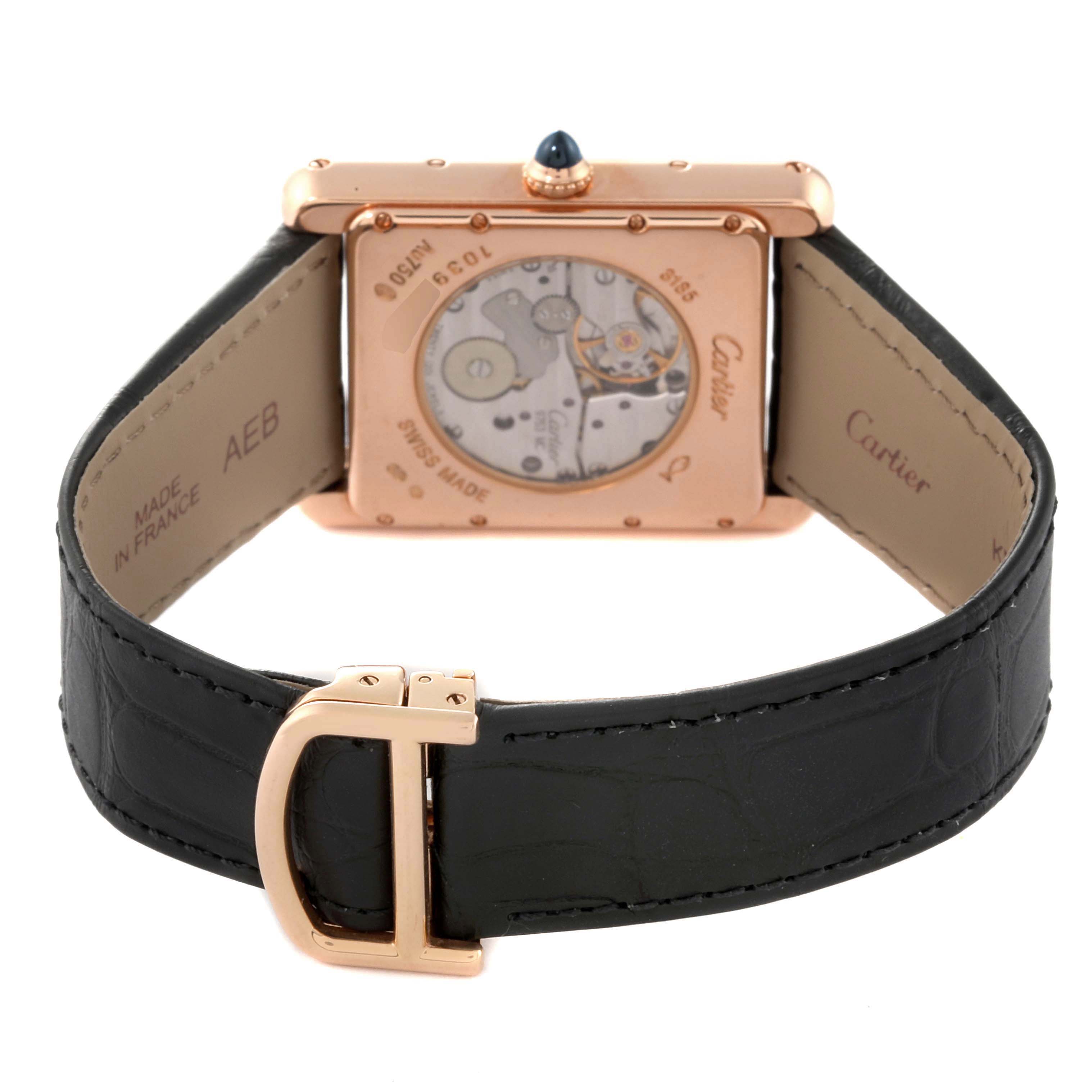 The image shows the back view of a Cartier Tank Louis W1560003 Men's Rose Gold Silver Dial W1560003 Men's Rose Gold Silver Dial watch, highlighting the movement and black leather strap with a gold buckle.