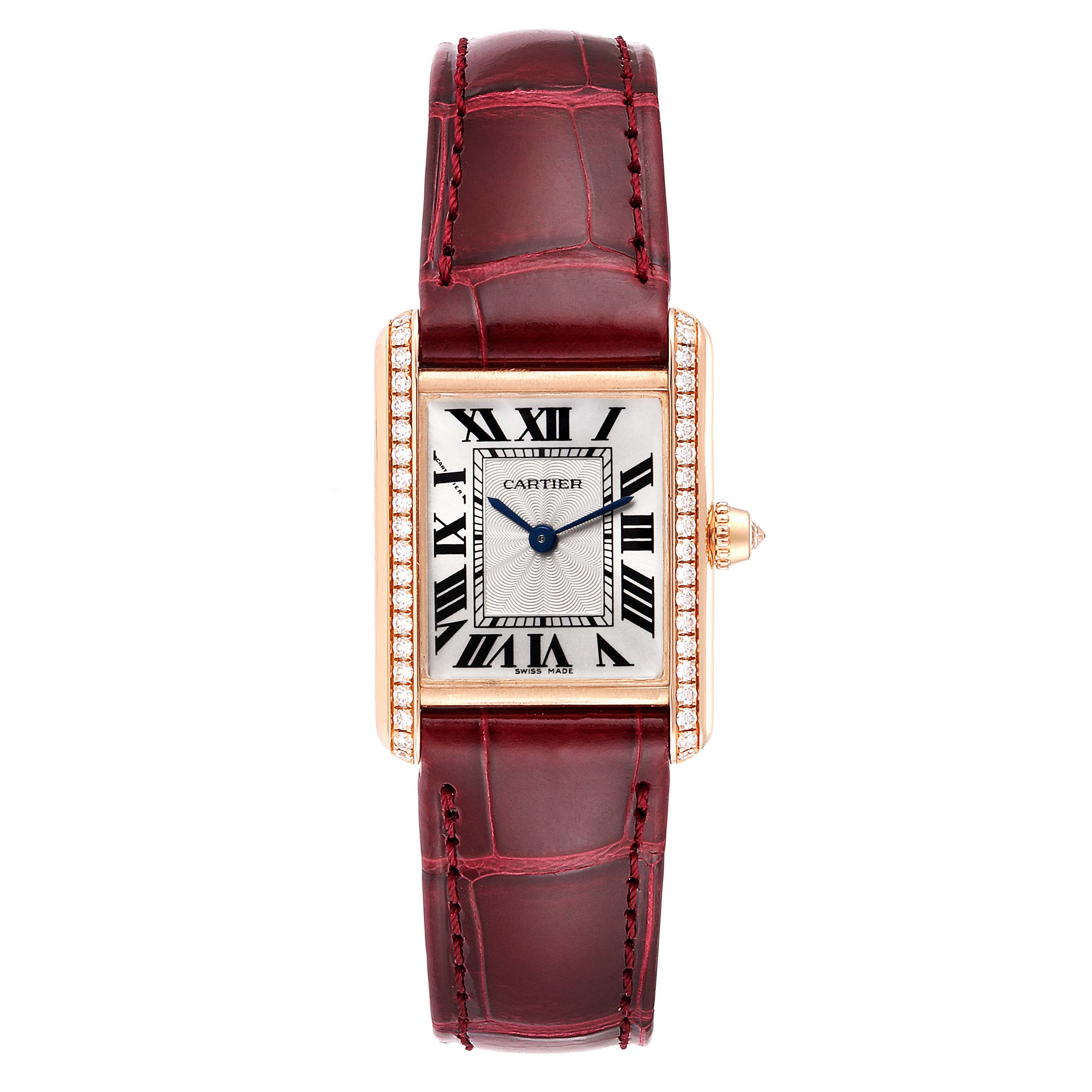 This image shows a Cartier Tank Louis WJTA0010 Women's Yellow Gold Silver Dial WJTA0010 Women's Yellow Gold Silver Dial watch with a rectangular dial, diamond bezel, and red leather strap from a frontal angle.