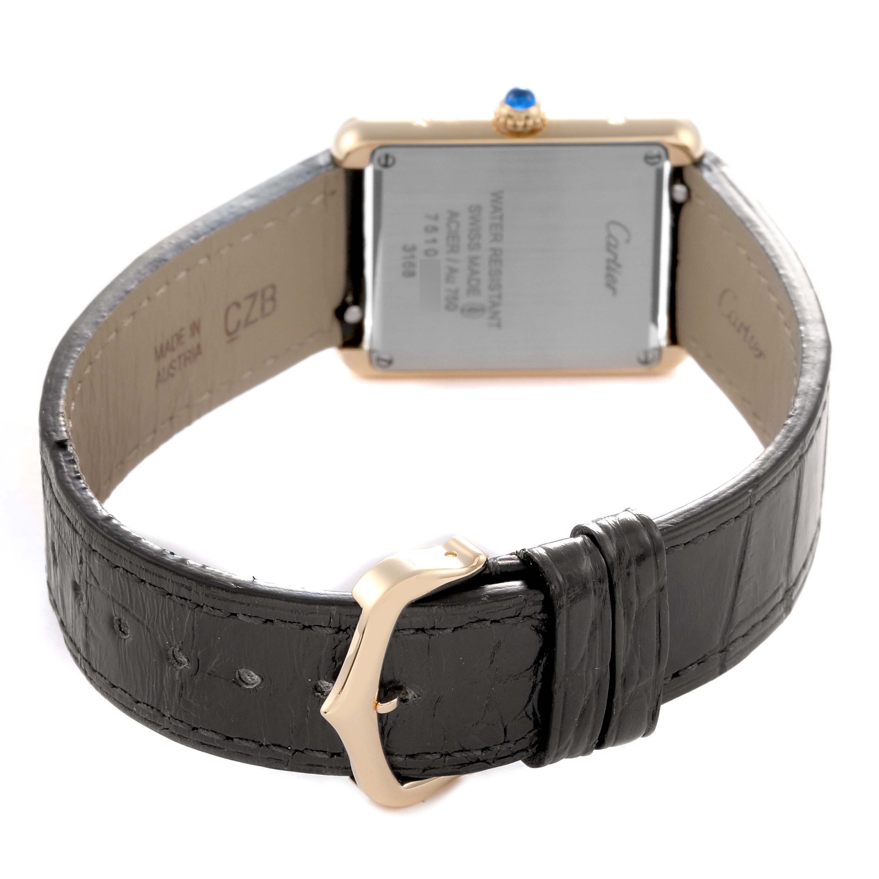 The image shows the back and strap of a Cartier Tank Solo watch, model W5200002, highlighting the case back, strap, and buckle at an angle.