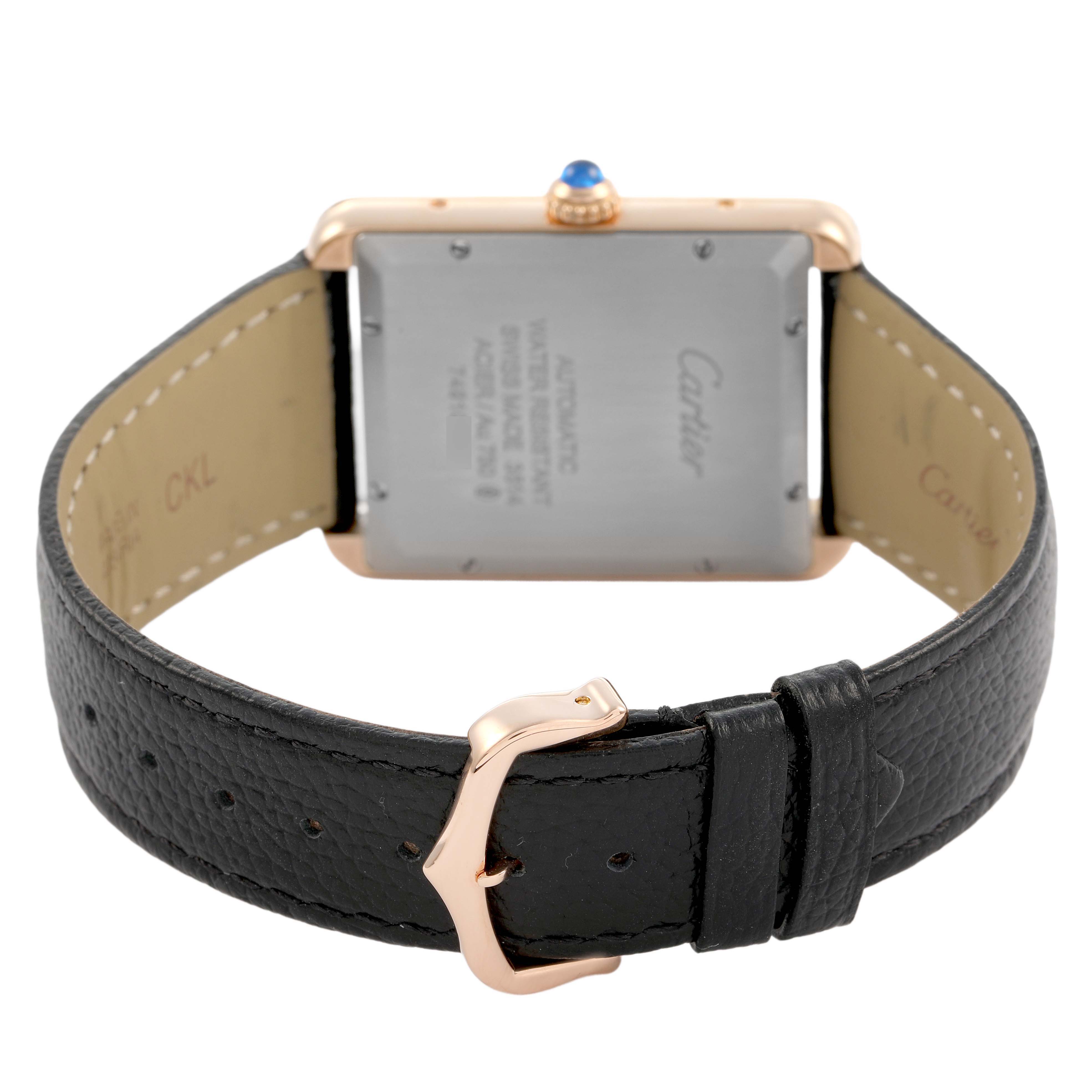 The Cartier Tank Solo W5200026 Men's Rose Gold Silver Dial watch is shown from the back, highlighting the clasp, caseback, and leather strap.