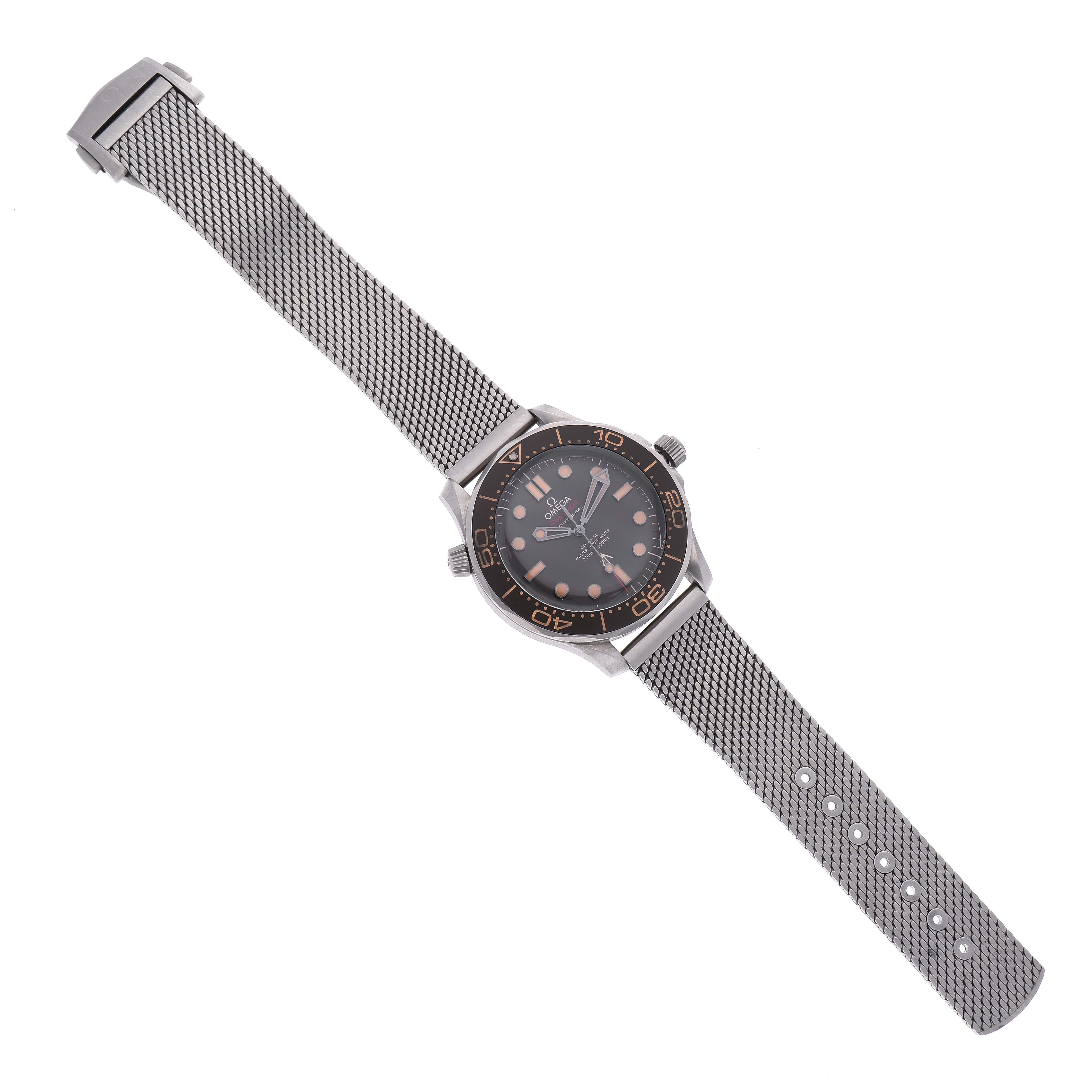 The Omega Seamaster 210.90.42.20.01.001 Men's Titanium Brown Dial 210.90.42.20.01.001 Men's Titanium Brown Dial watch is shown from an overhead angle, displaying the dial, bezel, case, and metal mesh strap.