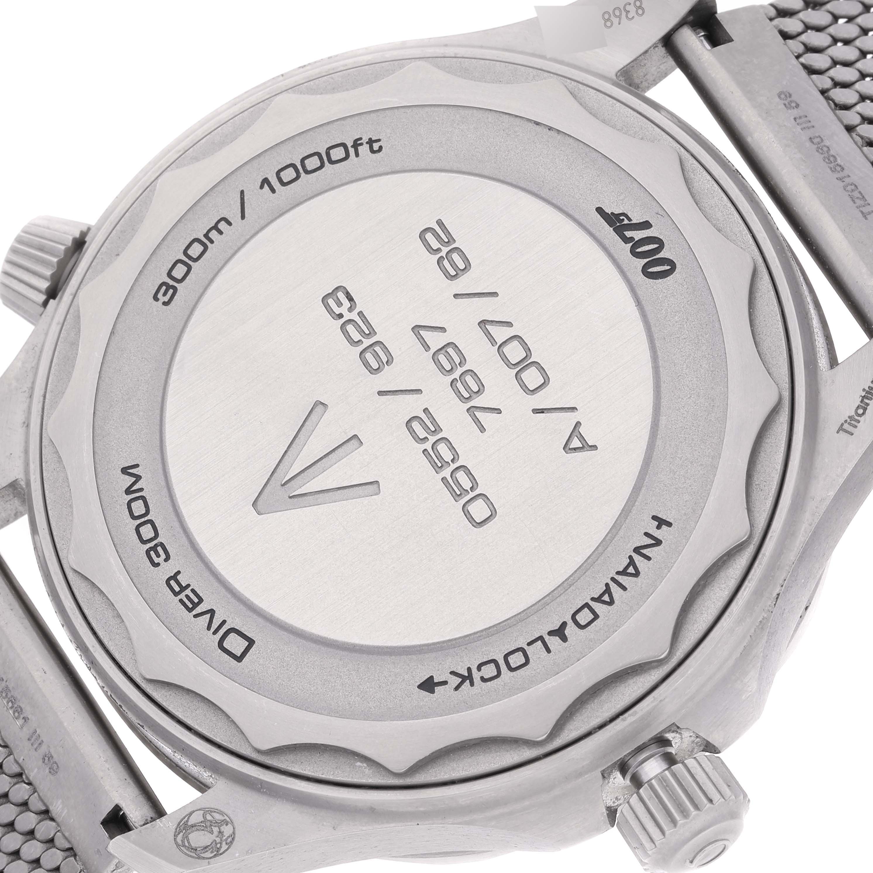 This image shows the back case and part of the strap of the Omega Seamaster 210.90.42.20.01.001 Men's Titanium Brown Dial 210.90.42.20.01.001 Men's Titanium Brown Dial watch, highlighting the water resistance and locking mechanism.