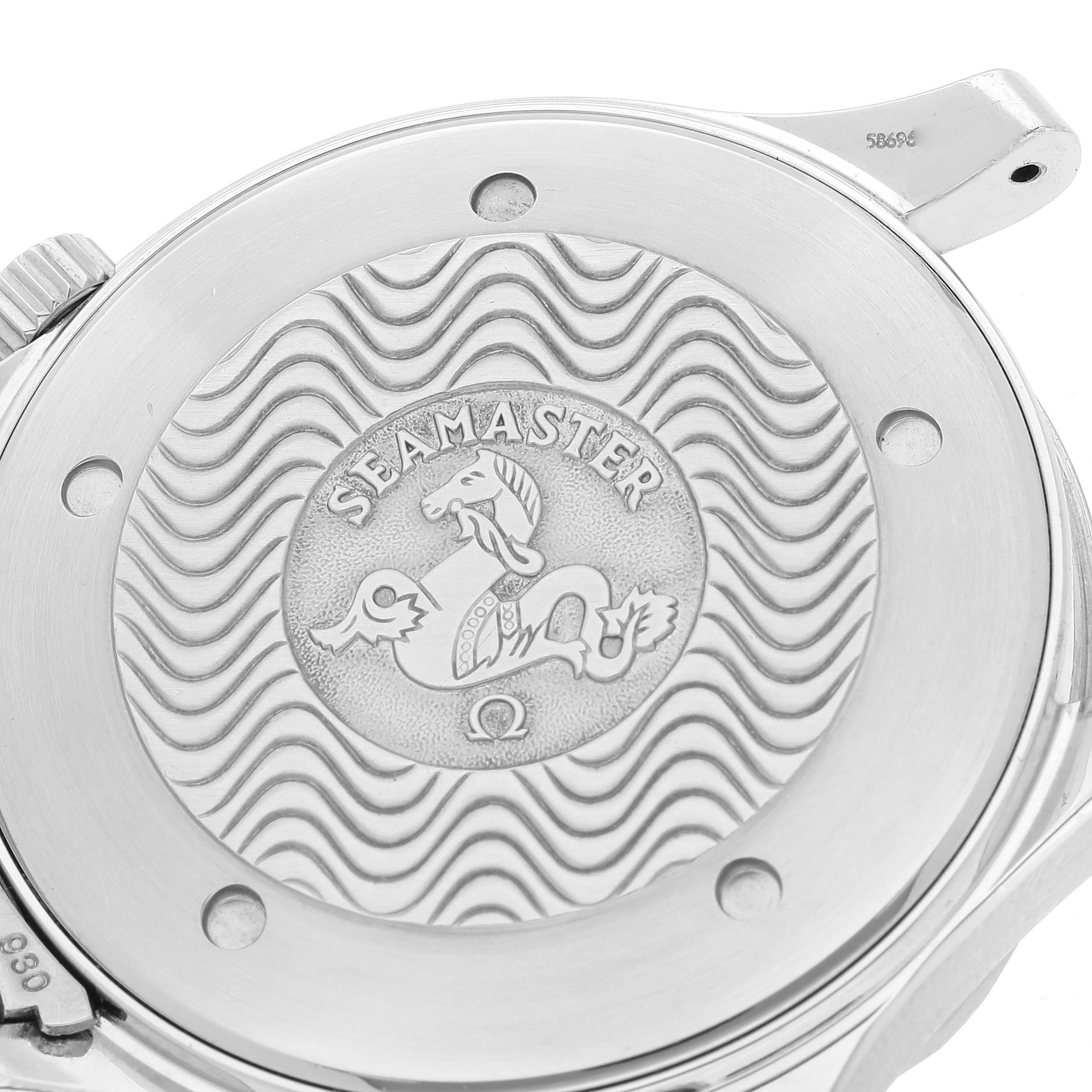 This image shows the case back of an Omega Seamaster 2264.50.00 Men's Stainless Steel Black Dial 2264.50.00 Men's Stainless Steel Black Dial watch, highlighting the engraved logo and wave pattern.