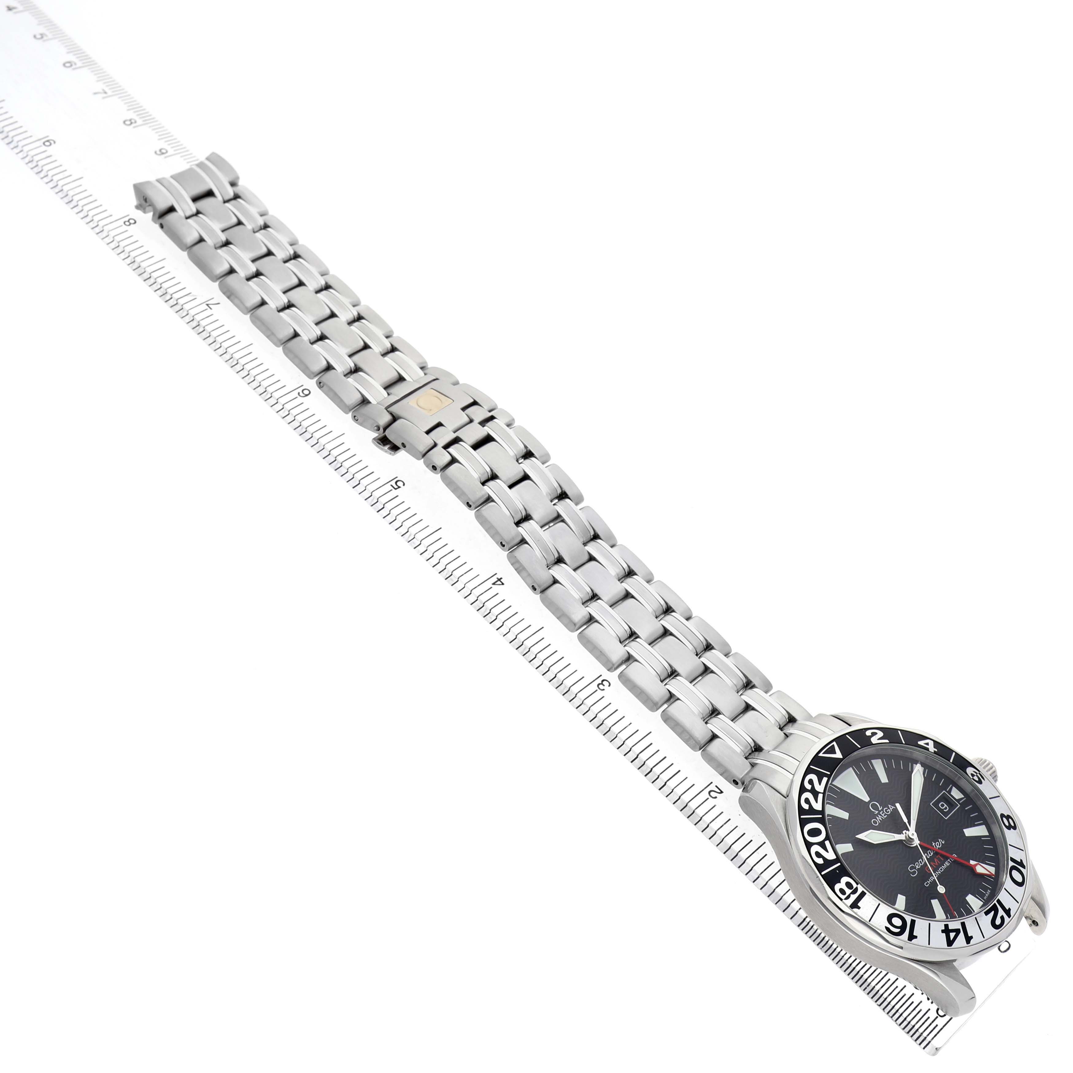The Omega Seamaster 2534.50.00 Men's Stainless Steel Black Dial watch is displayed at an oblique angle, showing the face, bezel, bracelet, and part of a measuring gauge.