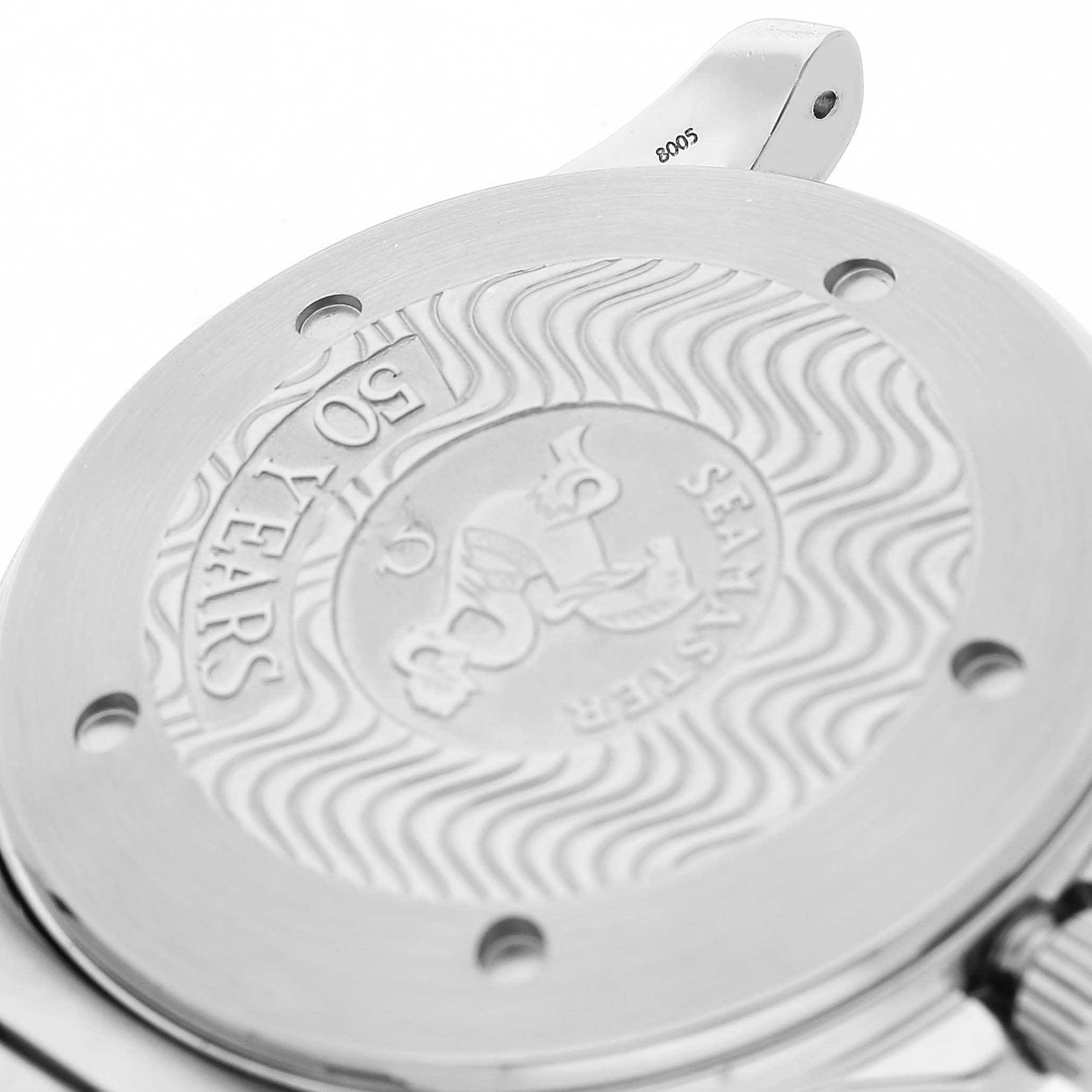 The image shows the back of the Omega Seamaster 2534.50.00 Men's Stainless Steel Black Dial watch at an angle, highlighting the engraved emblem and "50 Years" inscription.