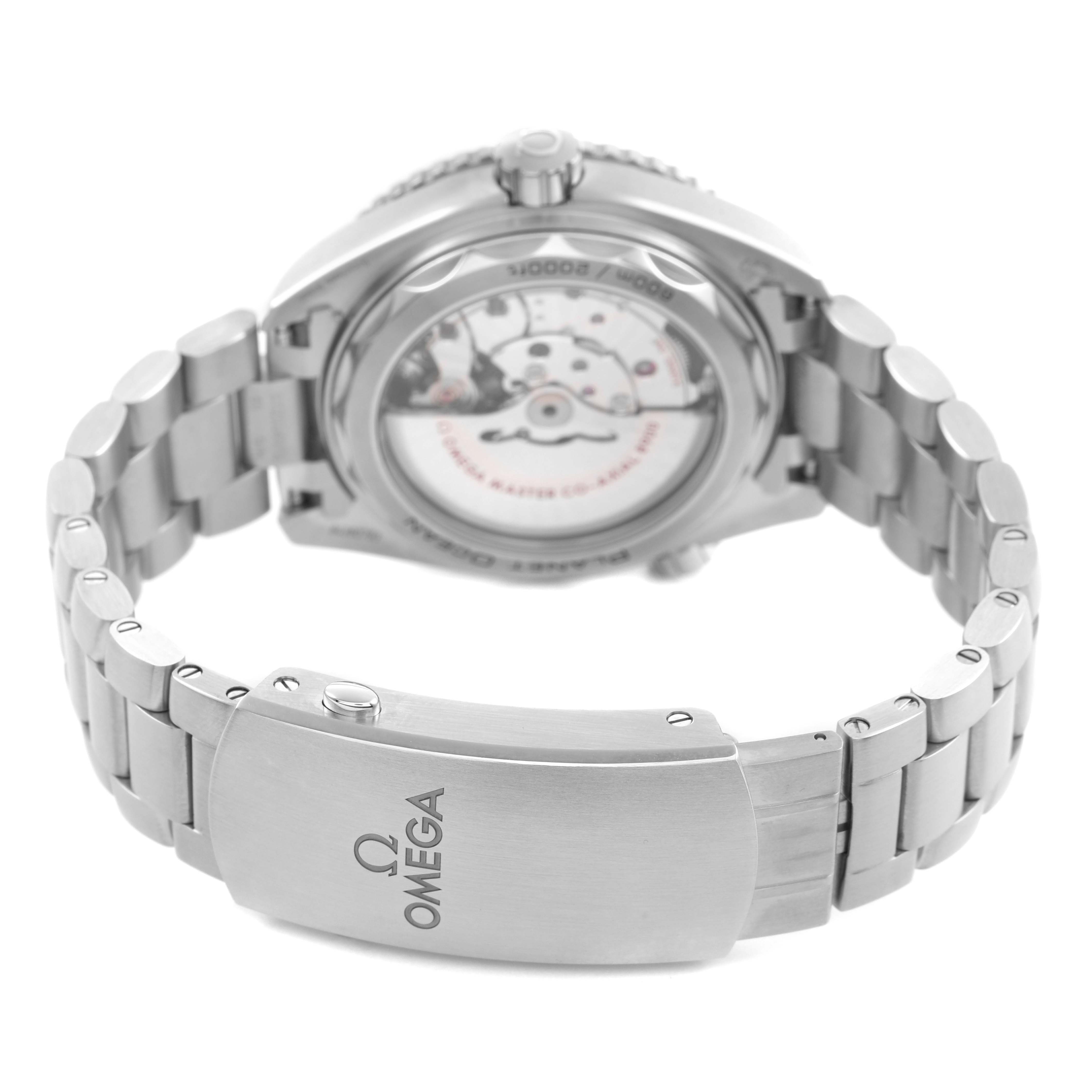 The Omega Seamaster 215.30.44.21.01.001 Men's Stainless Steel Black Dial watch is shown from the back, highlighting the open case back and metal bracelet.