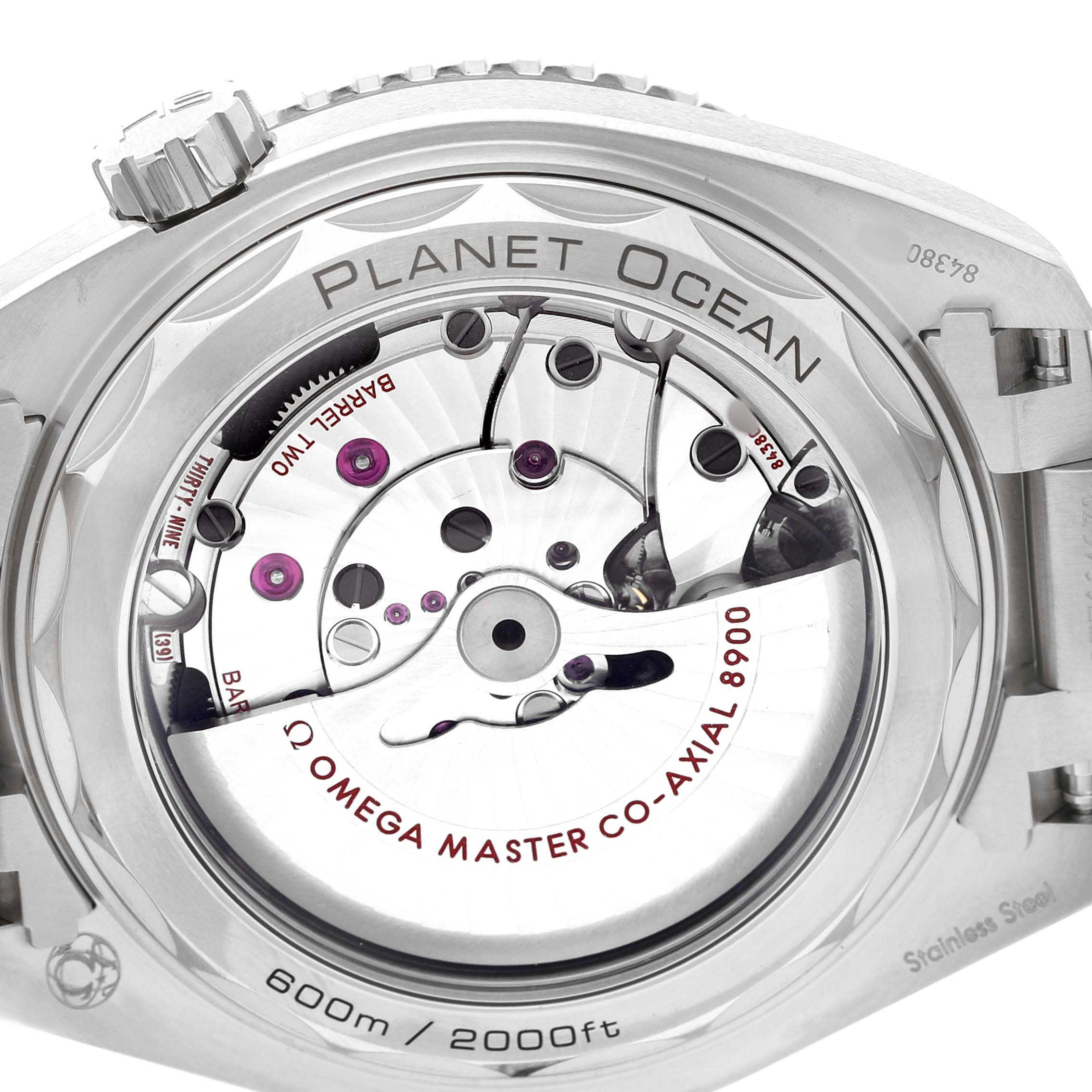 The image shows the back of the Omega Seamaster 215.30.44.21.01.001 Men's Stainless Steel Black Dial Planet Ocean, highlighting the movement and case inscriptions.
