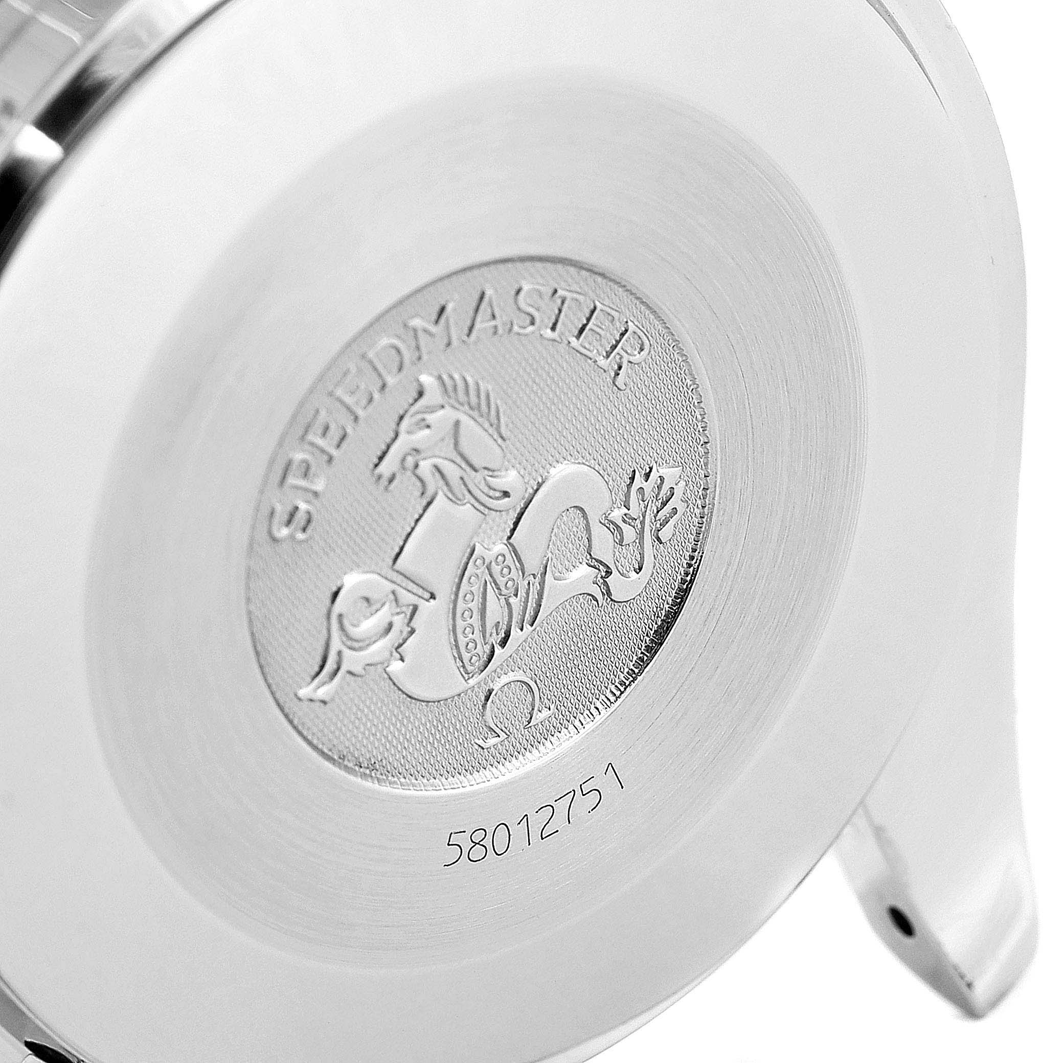 The image shows the engraved case back of an Omega Speedmaster 3510.50.00 Men
s Stainless Steel Black Dial 3510.50.00 Men
s Stainless Steel Black Dial watch at an angled close-up view.