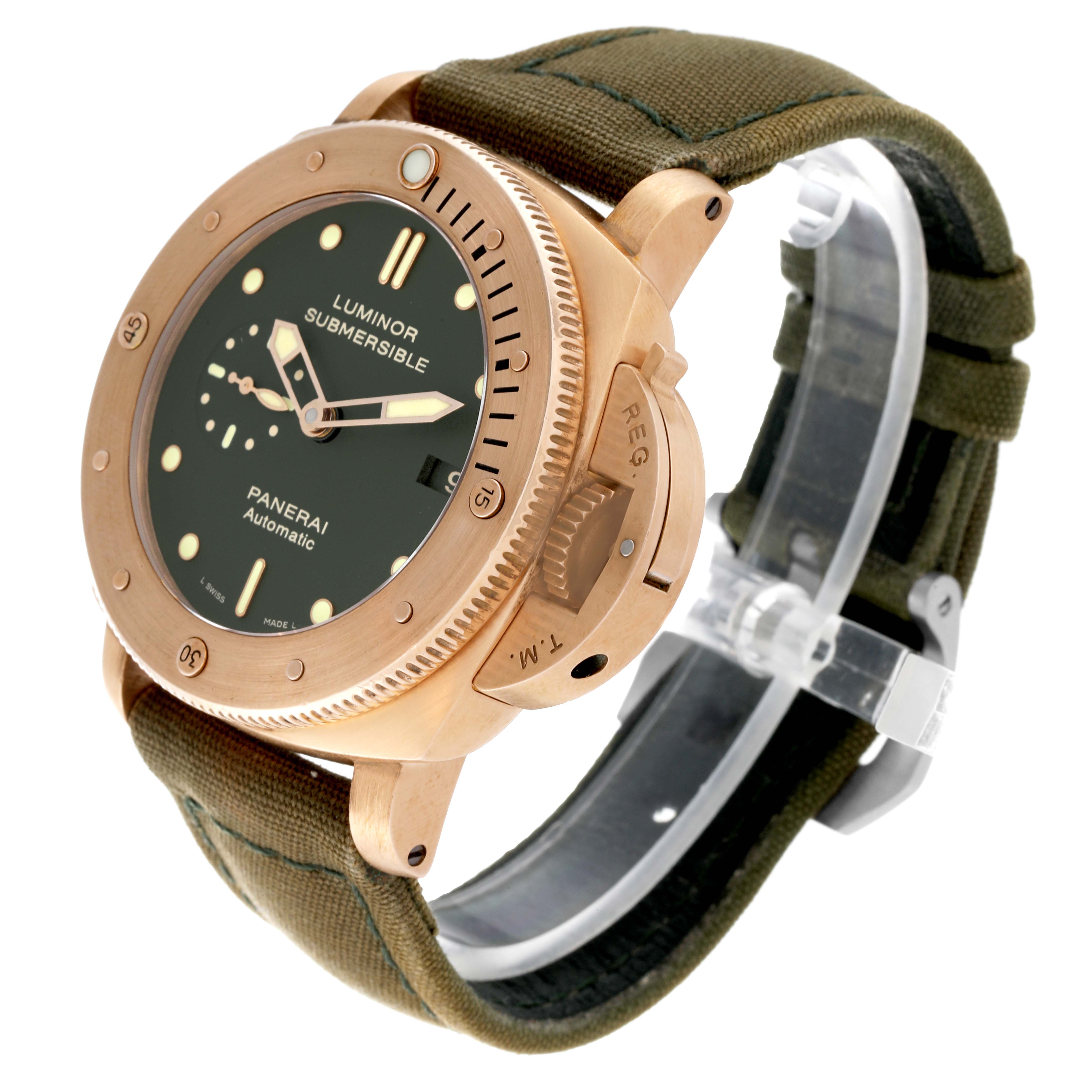 The image shows a Panerai Luminor Submersible watch with a green strap, viewed at a three-quarter angle.