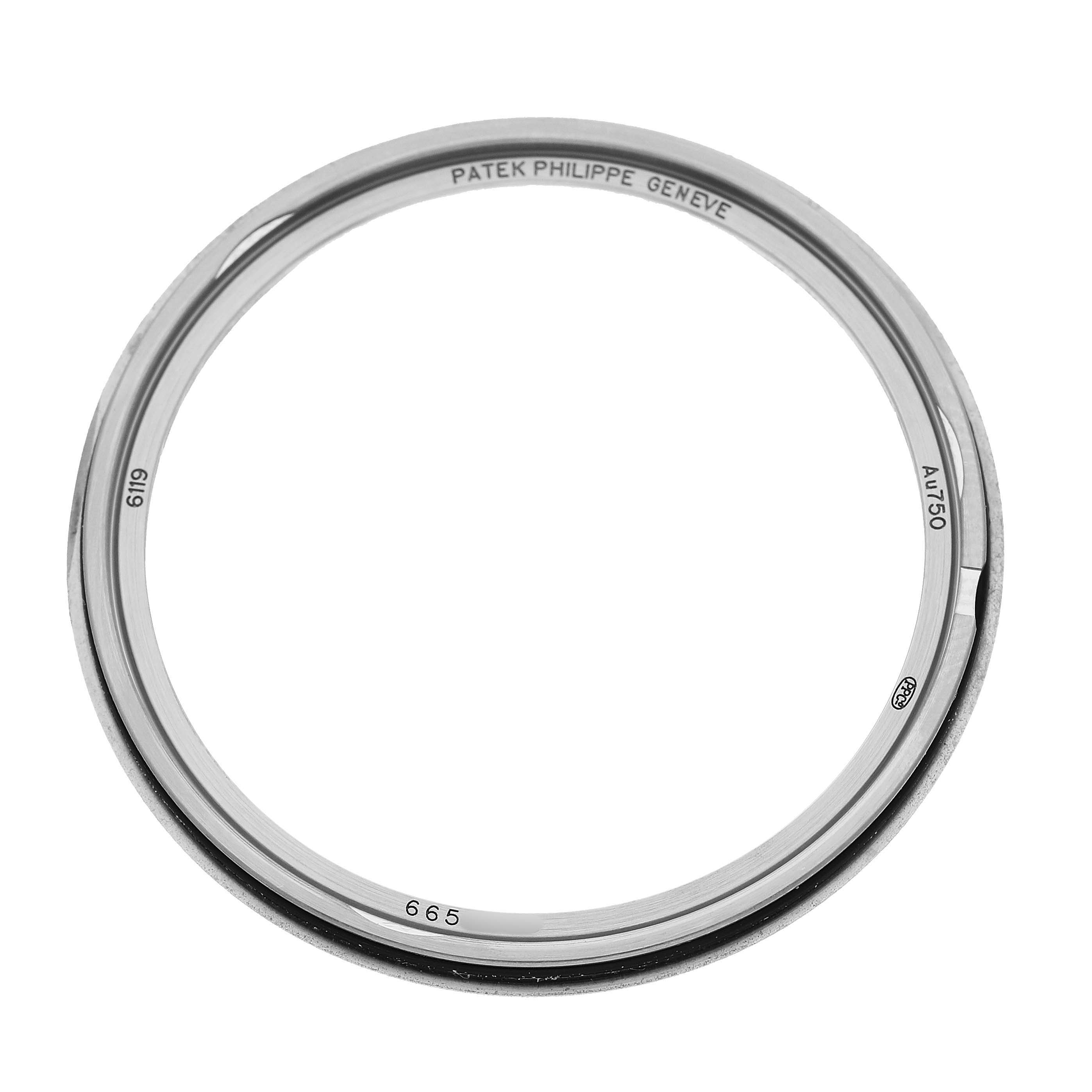 The image shows the bezel of a Patek Philippe Calatrava 6119G-001 Men's White Gold Grey Dial watch, viewed from the top angle.
