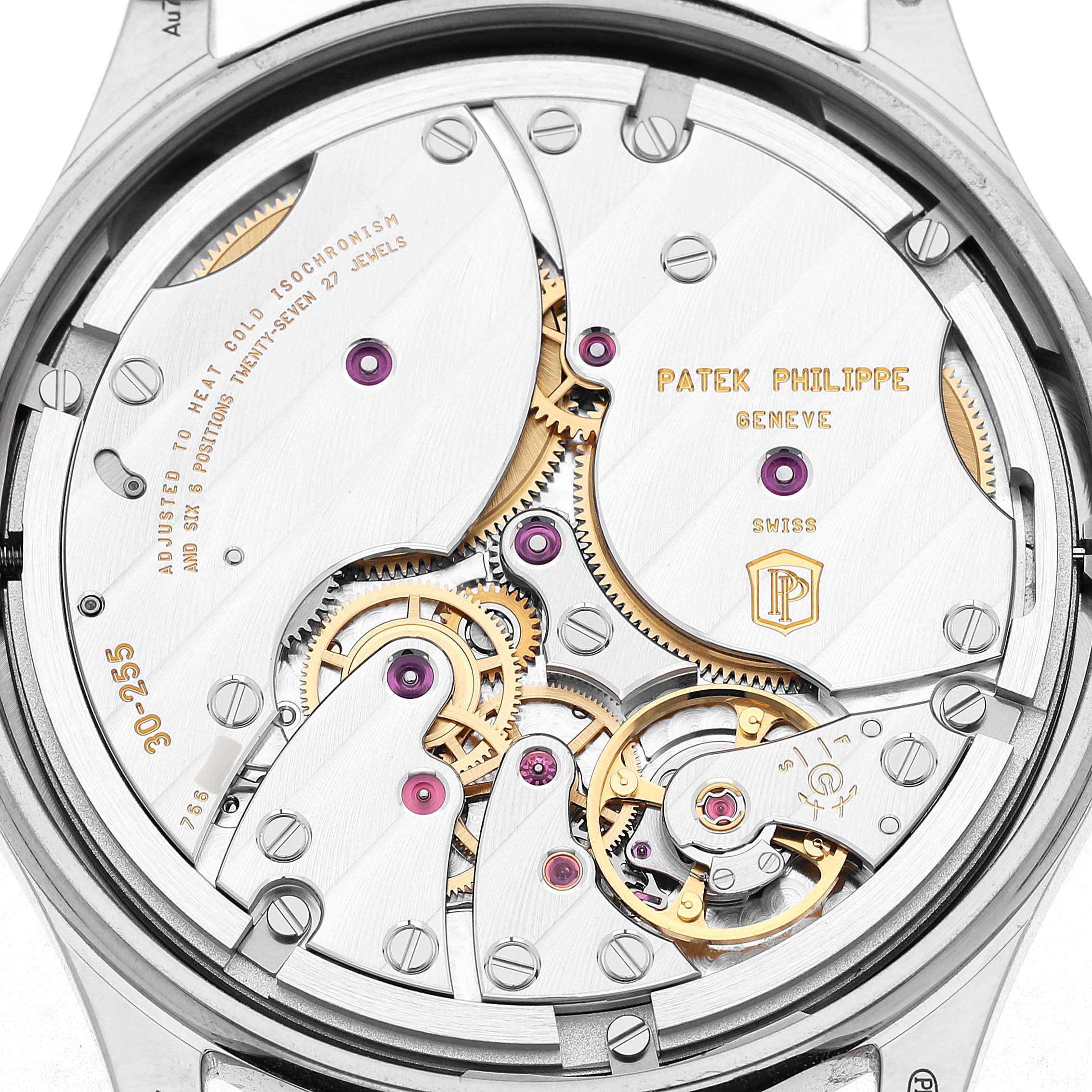 The image shows the back view of a Patek Philippe Calatrava 6119G-001 Men's White Gold Grey Dial, highlighting the intricate movement and mechanical components.