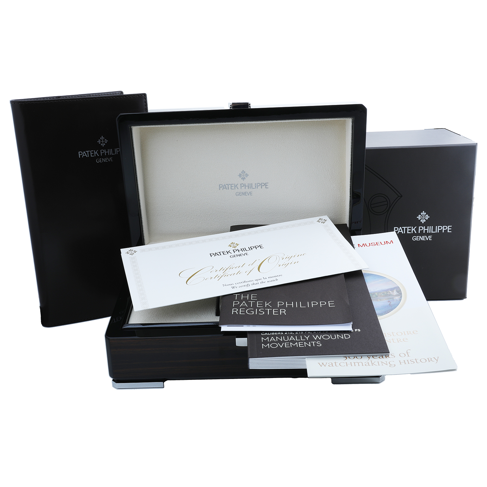 The image shows a Patek Philippe Calatrava 6119G-001 Men's White Gold Grey Dial watch box with documents and manuals at a slight angle.