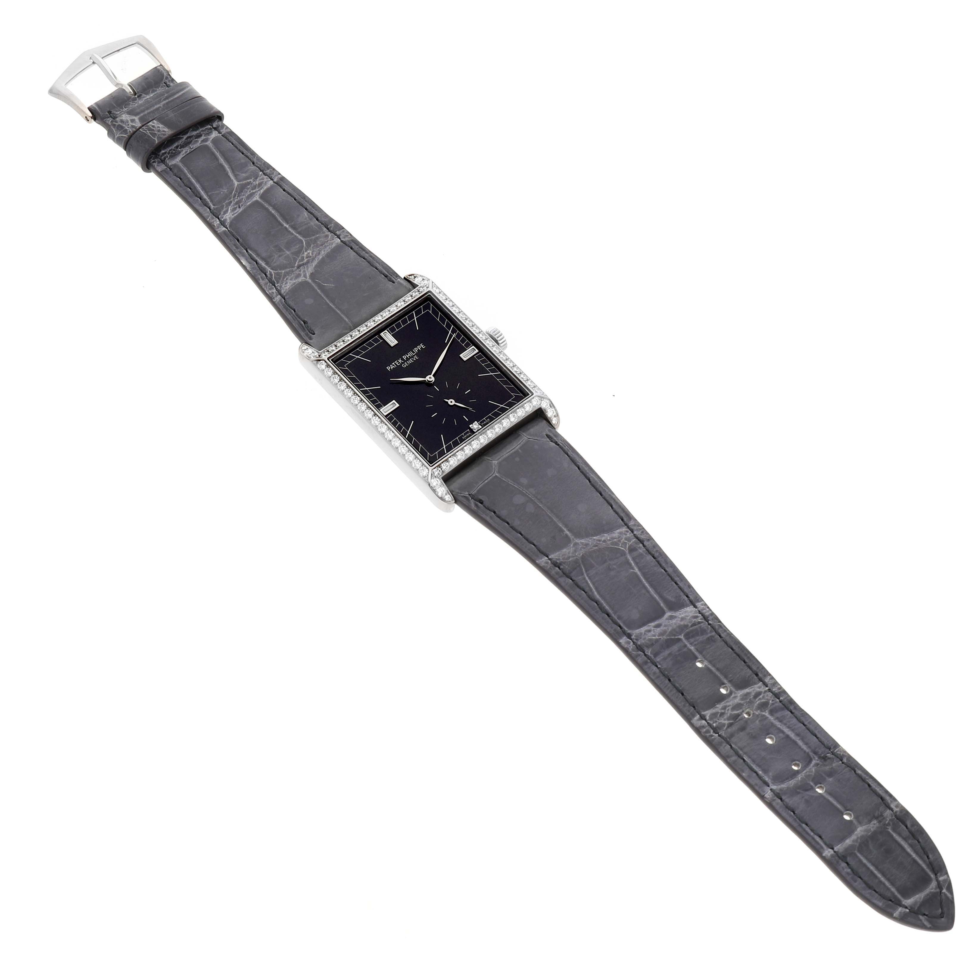 The Patek Philippe Gondolo 5112G Men's White Gold Black Dial watch is shown at a slight angle displaying the face, bezel, and grey alligator leather strap.