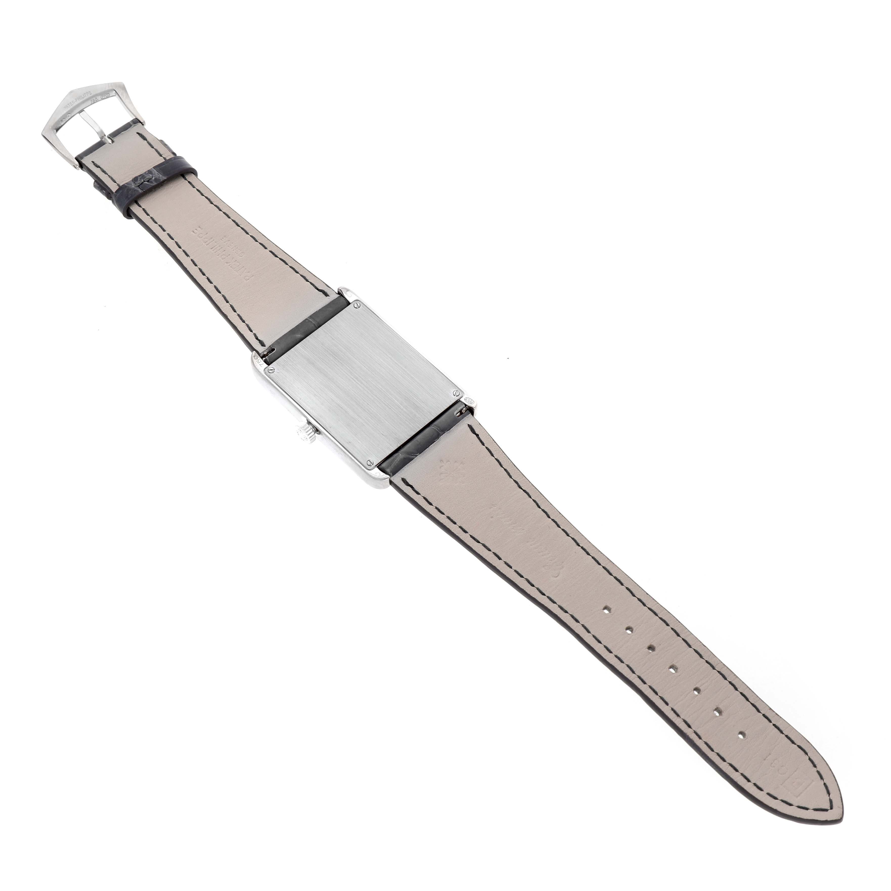 The image shows the back and strap of a Patek Philippe Gondolo 5112G Men's White Gold Black Dial watch, displayed flat and fully extended.
