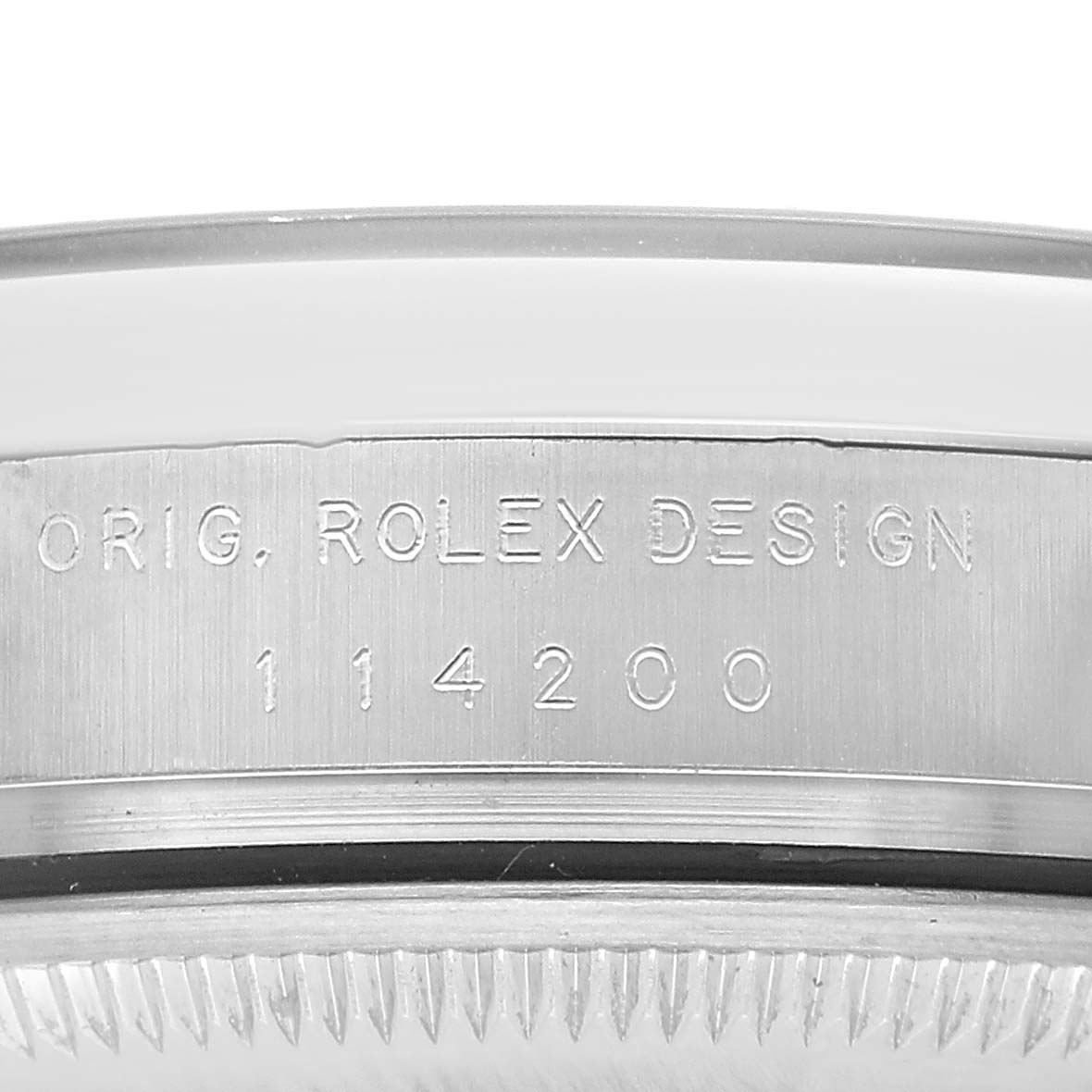 The image shows a close-up side view of the Rolex Air-King 114200 Men's Stainless Steel Silver Dial with the model number 114200 and the engraving "ORIG, ROLEX DESIGN."