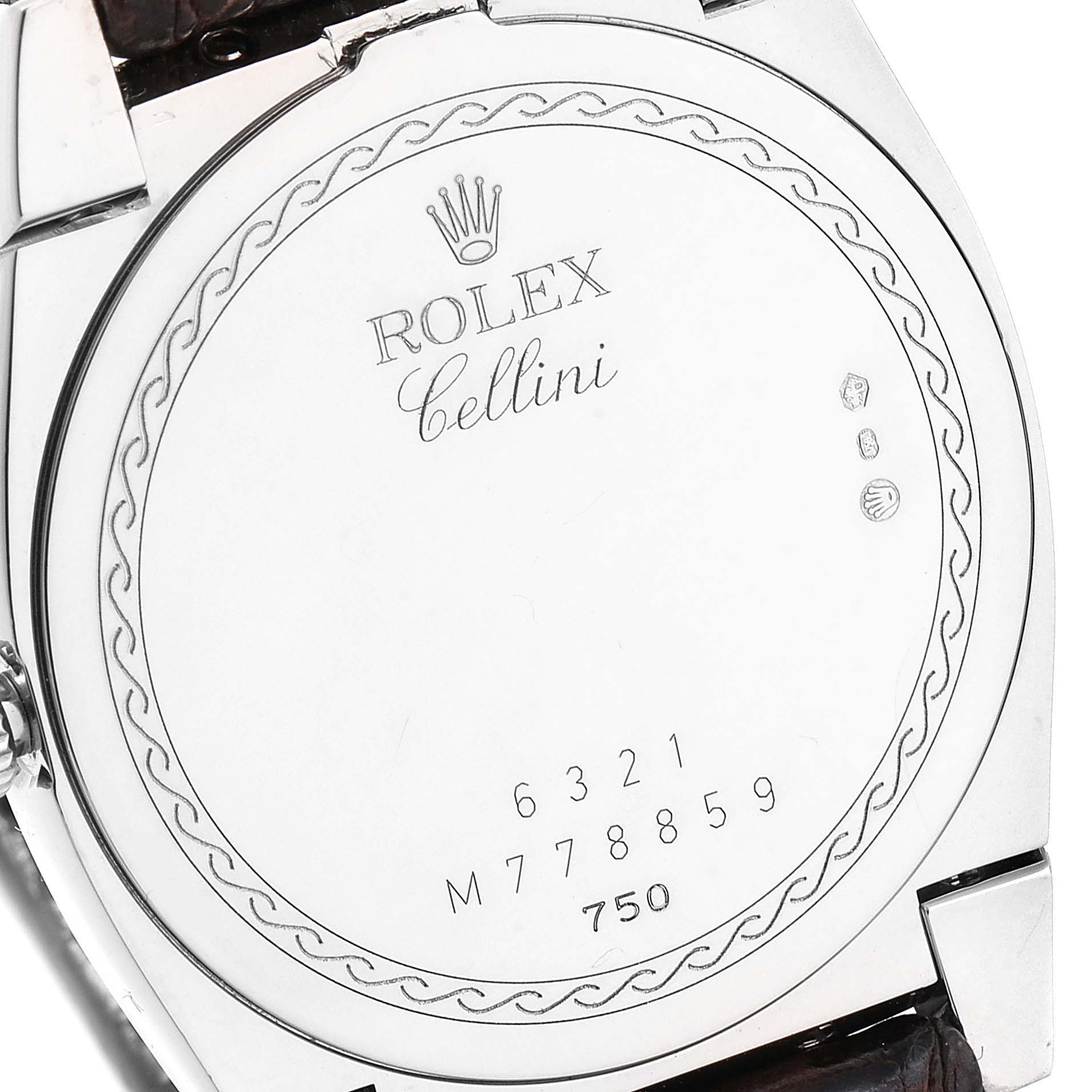 The image shows the back case of a Rolex Cellini 6321 Women's White Gold Mother of Pearl Dial 6321 Women's White Gold Mother of Pearl Dial watch, featuring its engraved branding and serial numbers.
