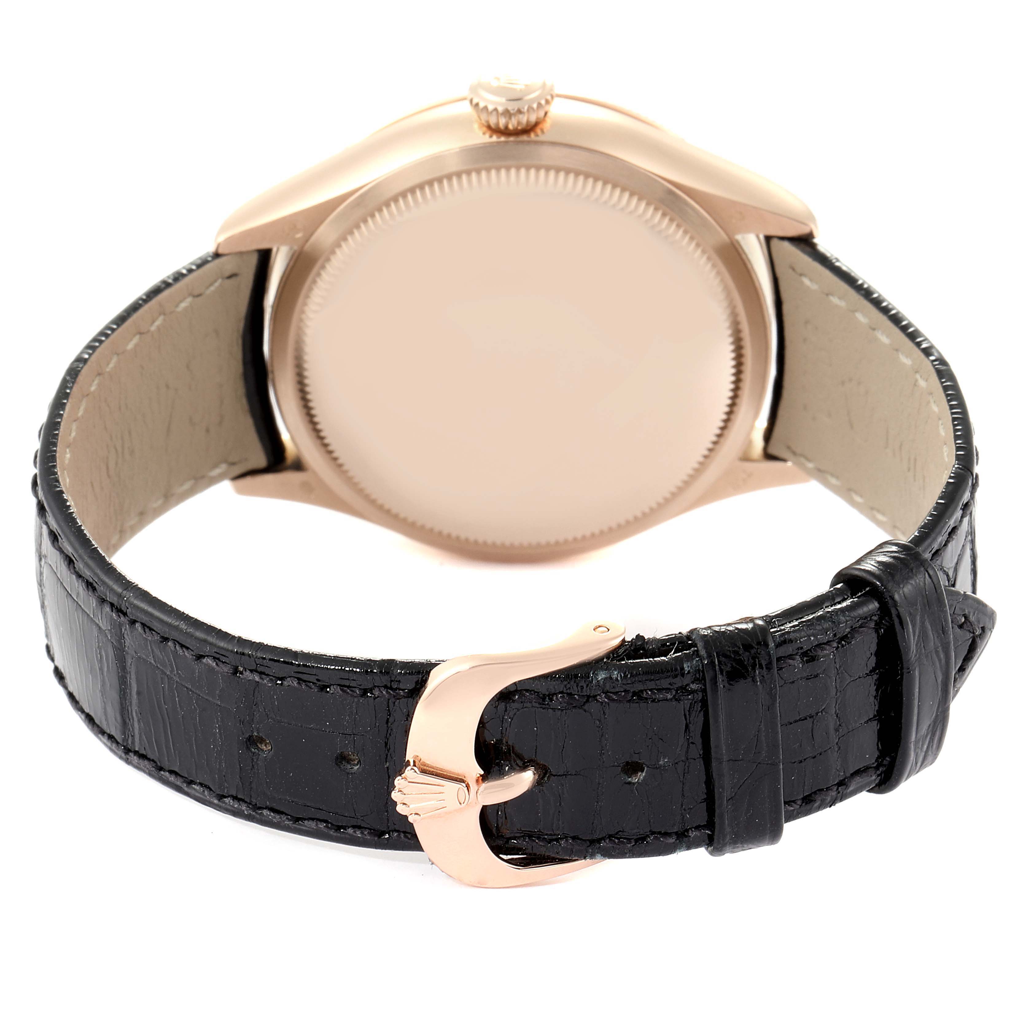 The image shows the back case and black leather strap of a Rolex Cellini 50515 Men's Rose Gold Black Dial 50515 Men's Rose Gold Black Dial model watch.
