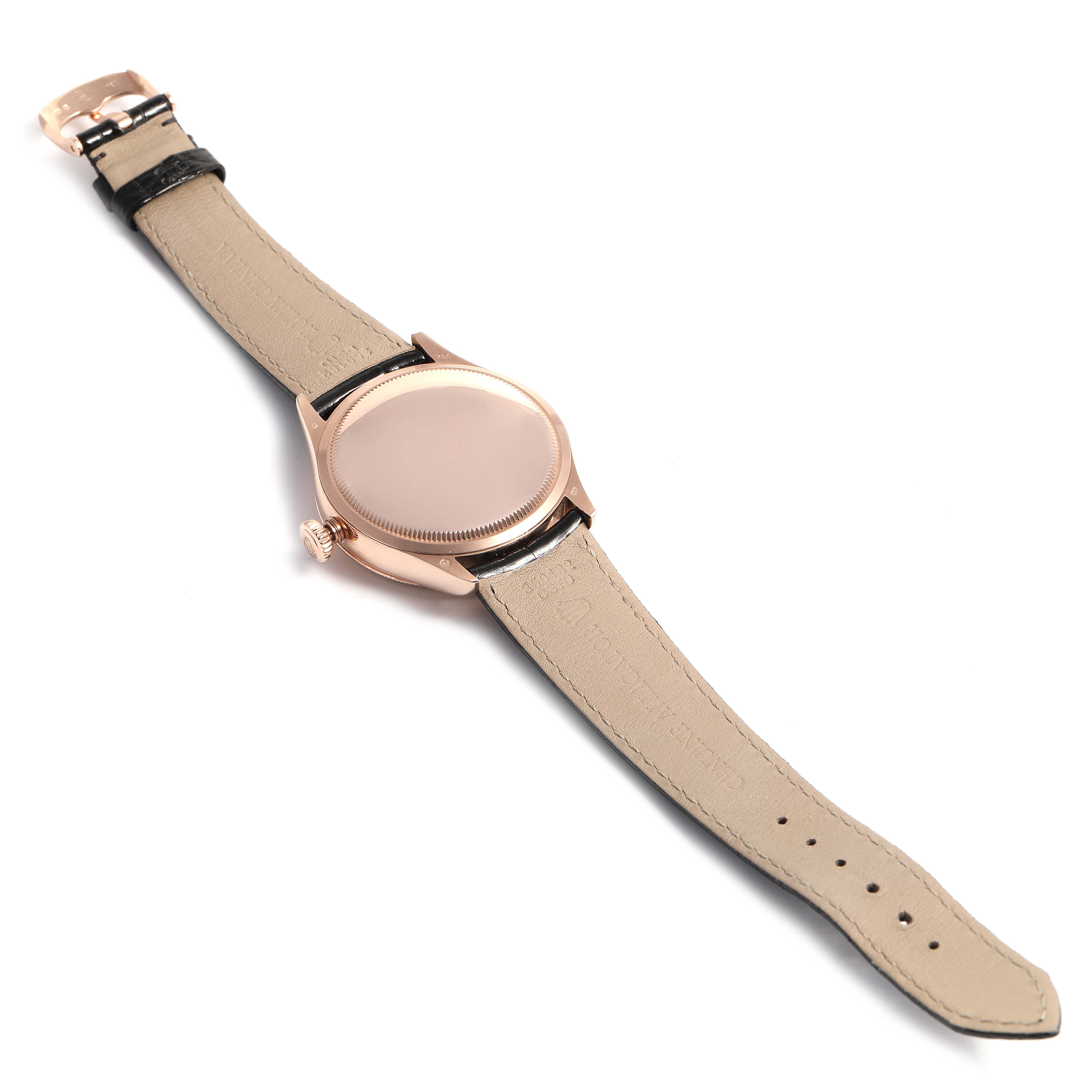 This image shows the back and underside of a Rolex Cellini 50515 Men's Rose Gold Black Dial 50515 Men's Rose Gold Black Dial watch, displaying the strap and case.