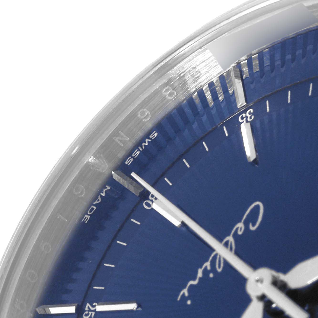 A partial close-up of the dial and bezel of the Rolex Cellini 50519 Men's White Gold Blue Dial 50519 Men's White Gold Blue Dial watch, showing the hands and indices.