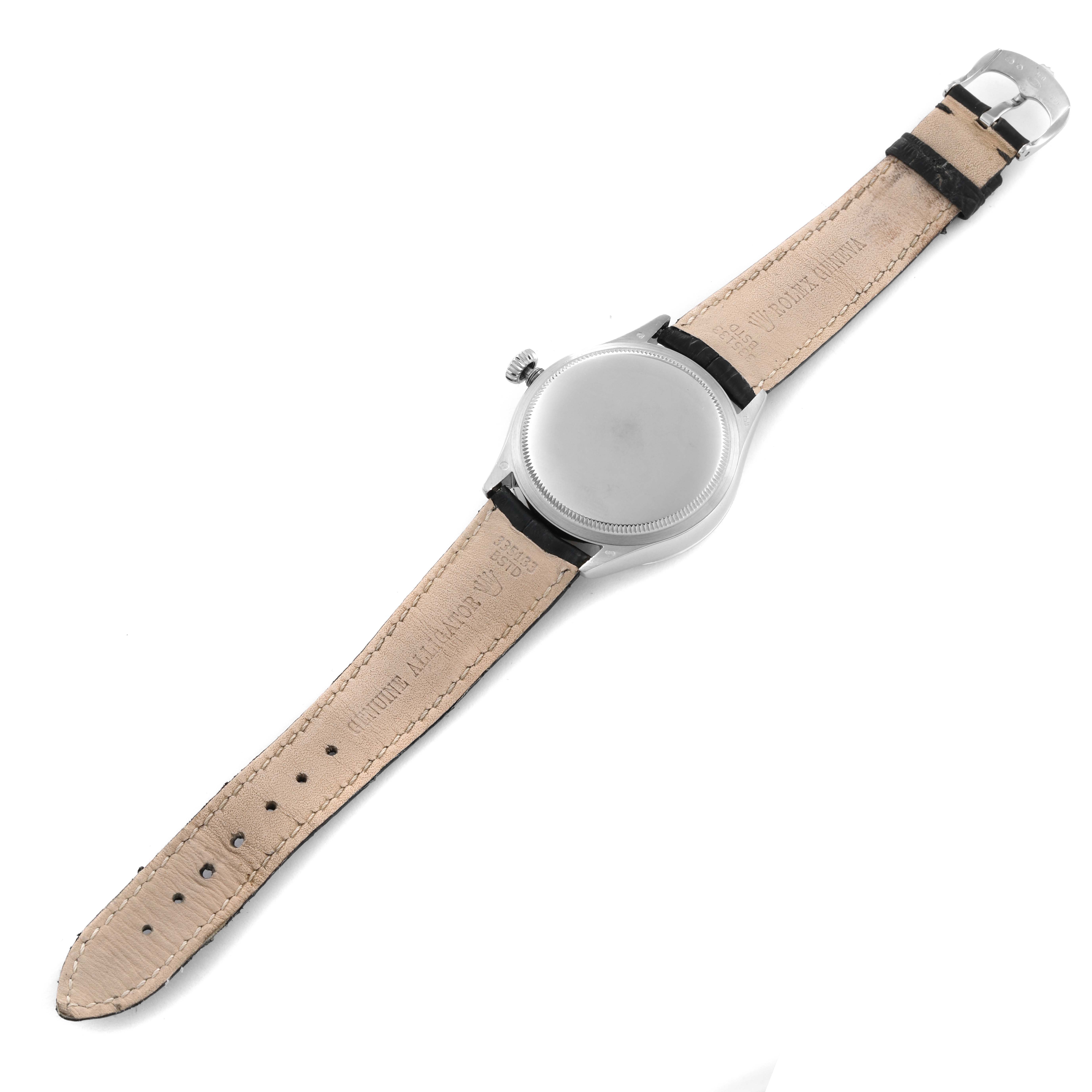 The image shows the backside of a Rolex Cellini 50519 Men's White Gold Blue Dial 50519 Men's White Gold Blue Dial watch, displaying the case, leather straps, and buckle clasp.