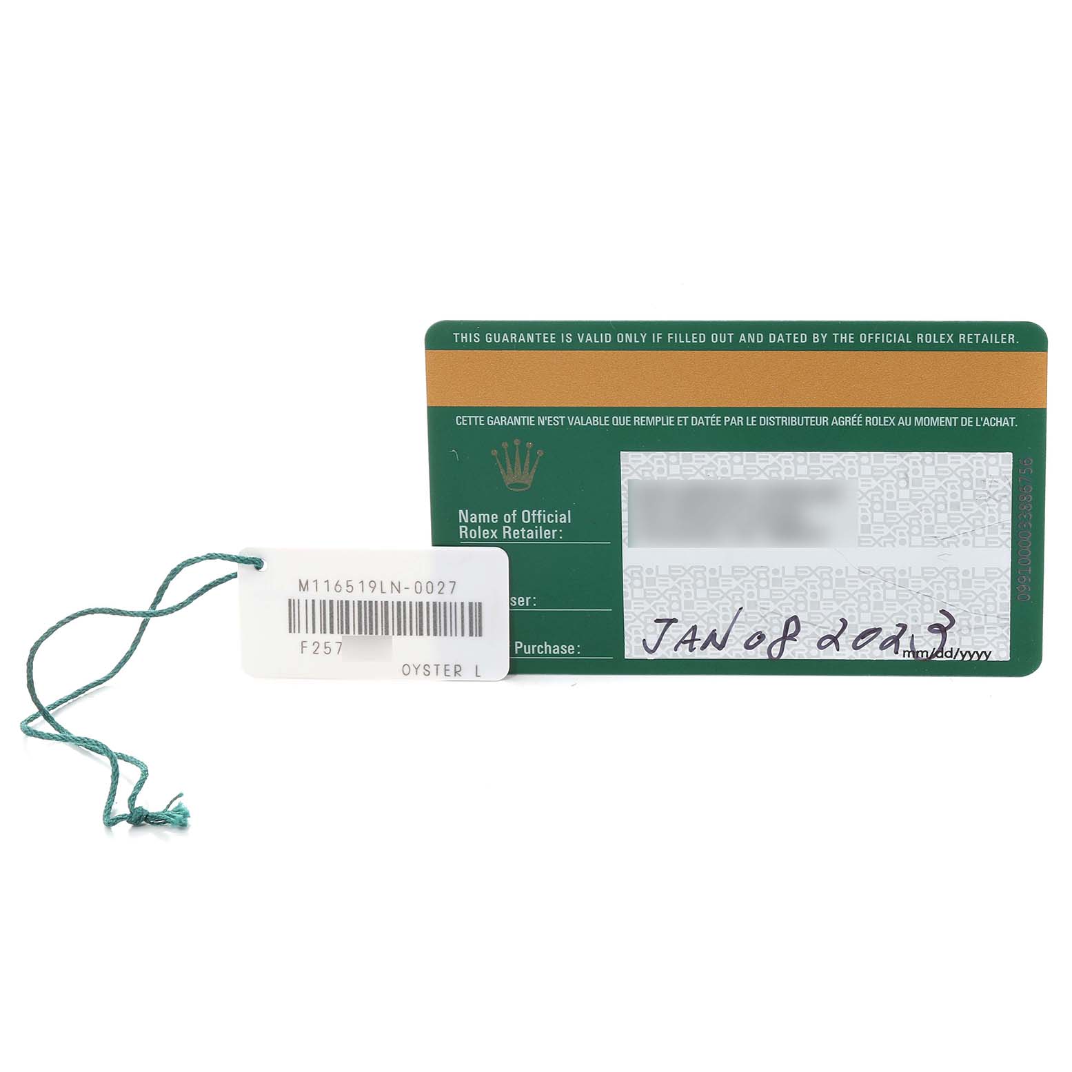 This image shows the guarantee card and tag of a Rolex Daytona 116519 Men's White Gold Grey Dial 116519 Men's White Gold Grey Dial watch, model reference M116519LN-0027, with the date of purchase noted.