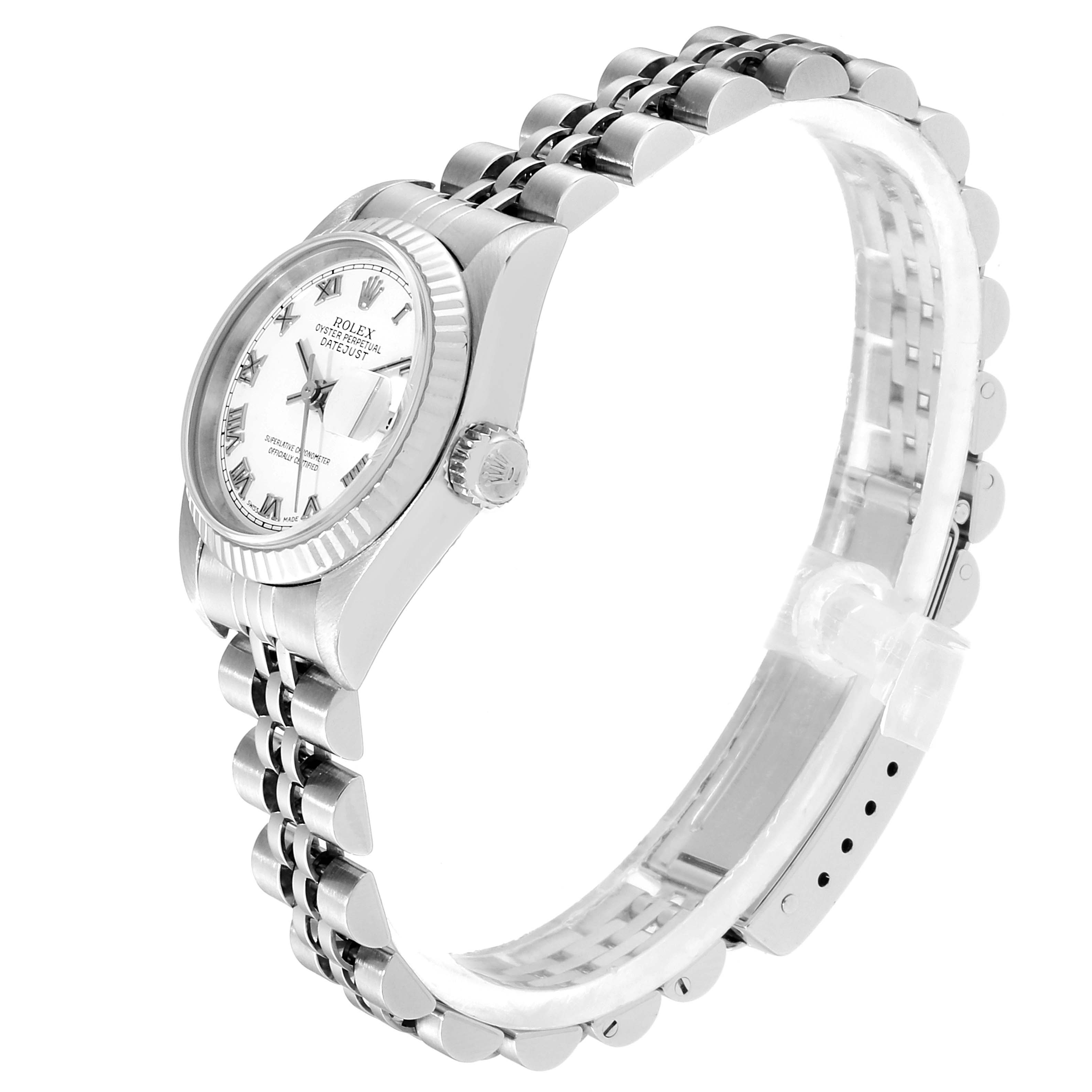 This image shows a side profile of the Rolex Datejust 79174 Women
s Stainless Steel White Dial 79174 Women
s Stainless Steel White Dial, highlighting the bezel, crown, and bracelet.