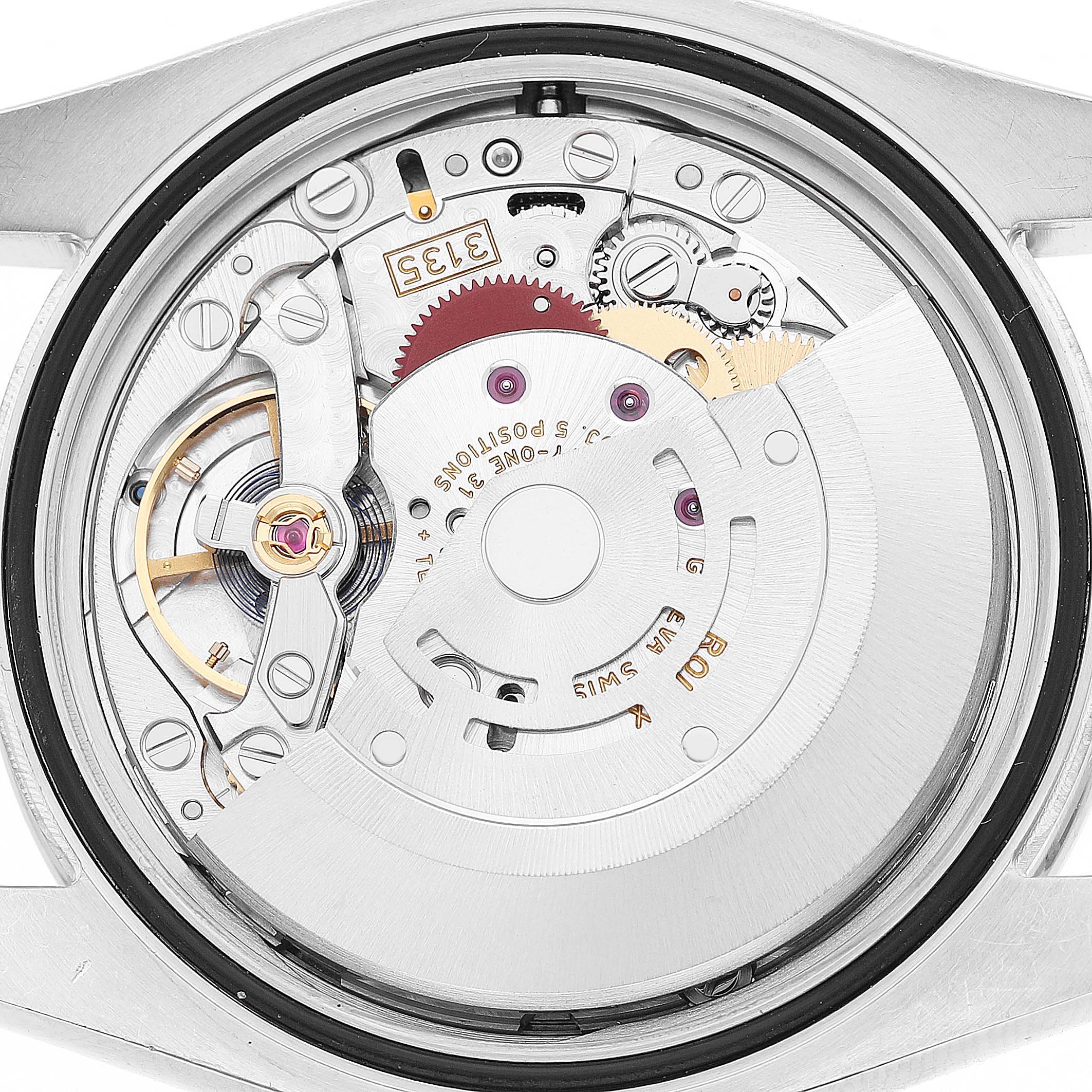 This image shows the movement of a Rolex Datejust 116244 Men's Stainless Steel Silver Dial watch, featuring gears and intricate components from the back angle.