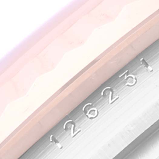 The image focuses on the engraved model number "126231" on the bezel of a Rolex Datejust 126231 Men's Steel and Gold (two tone) Pink Dial 126231 Men's Steel and Gold (two tone) Pink Dial watch.