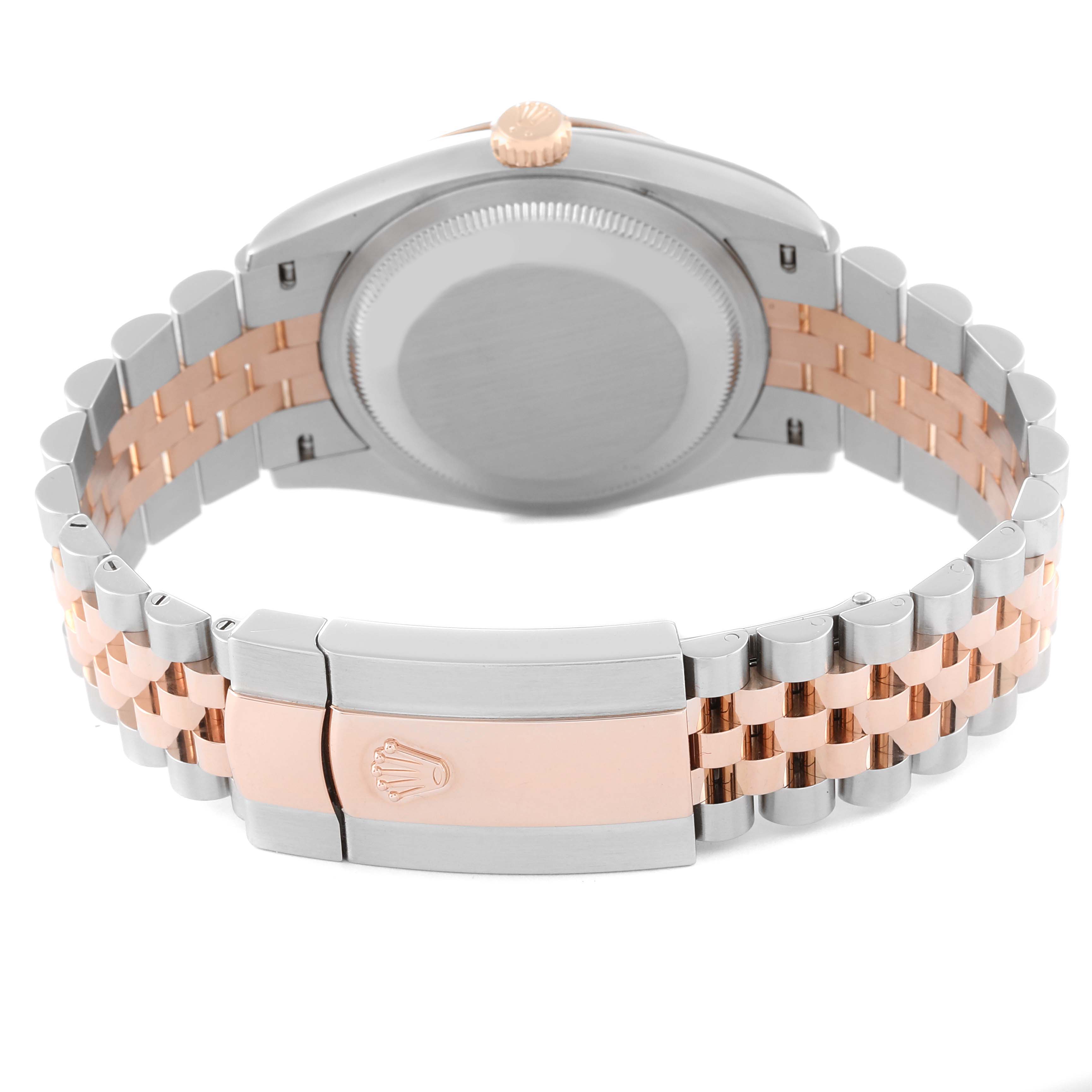 The image shows the back and bracelet of the Rolex Datejust 126231 Men's Steel and Gold (two tone) Pink Dial 126231 Men's Steel and Gold (two tone) Pink Dial watch, highlighting the two-tone metal and clasp.